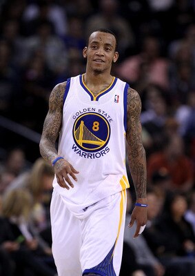 OAKLAND, CA - JANUARY 21:  Monta Ellis #8 of the Golden State Warriors walks back down court during their game against the Sacramento Kings at Oracle Arena on January 21, 2011 in Oakland, California. NOTE TO USER: User expressly acknowledges and agrees th