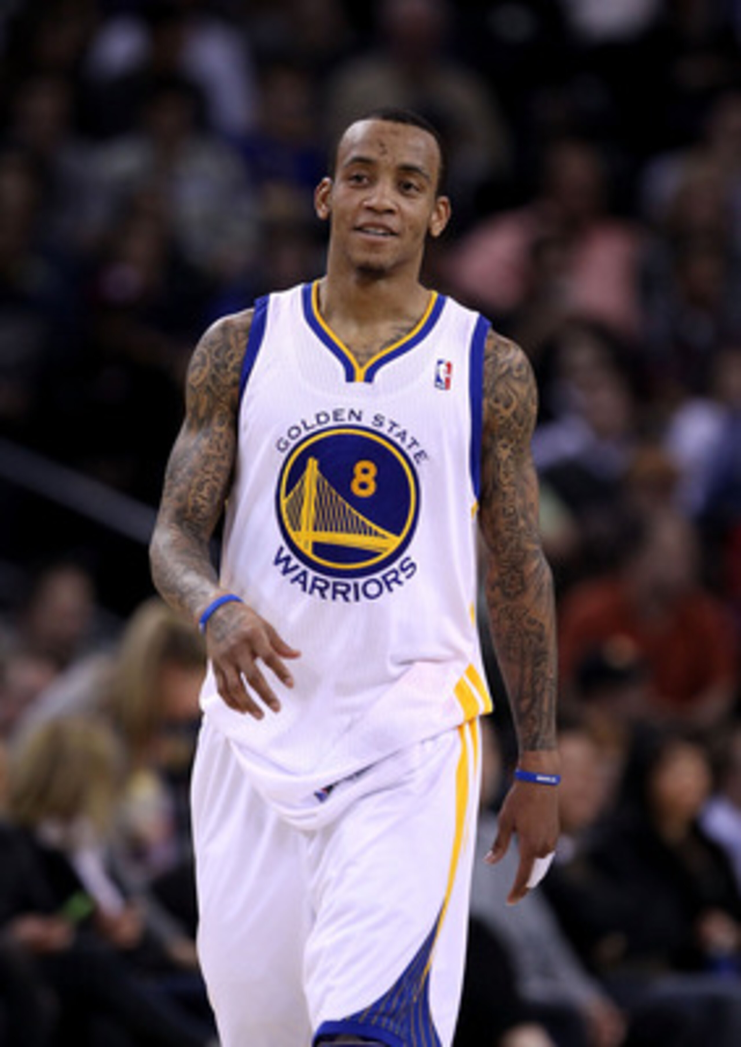 OAKLAND, CA - JANUARY 21:  Monta Ellis #8 of the Golden State Warriors walks back down court during their game against the Sacramento Kings at Oracle Arena on January 21, 2011 in Oakland, California. NOTE TO USER: User expressly acknowledges and agrees th