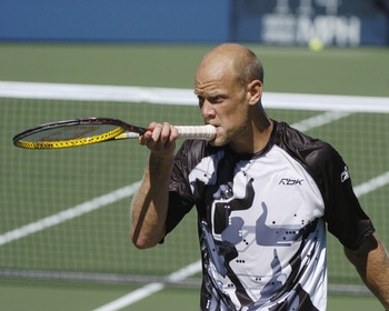 Murphy Jensen clowns around and competes in the men's masters doubles  September 10, 2004  at the 2004 US Open in New York. (Photo by A. Messerschmidt/Getty Images)