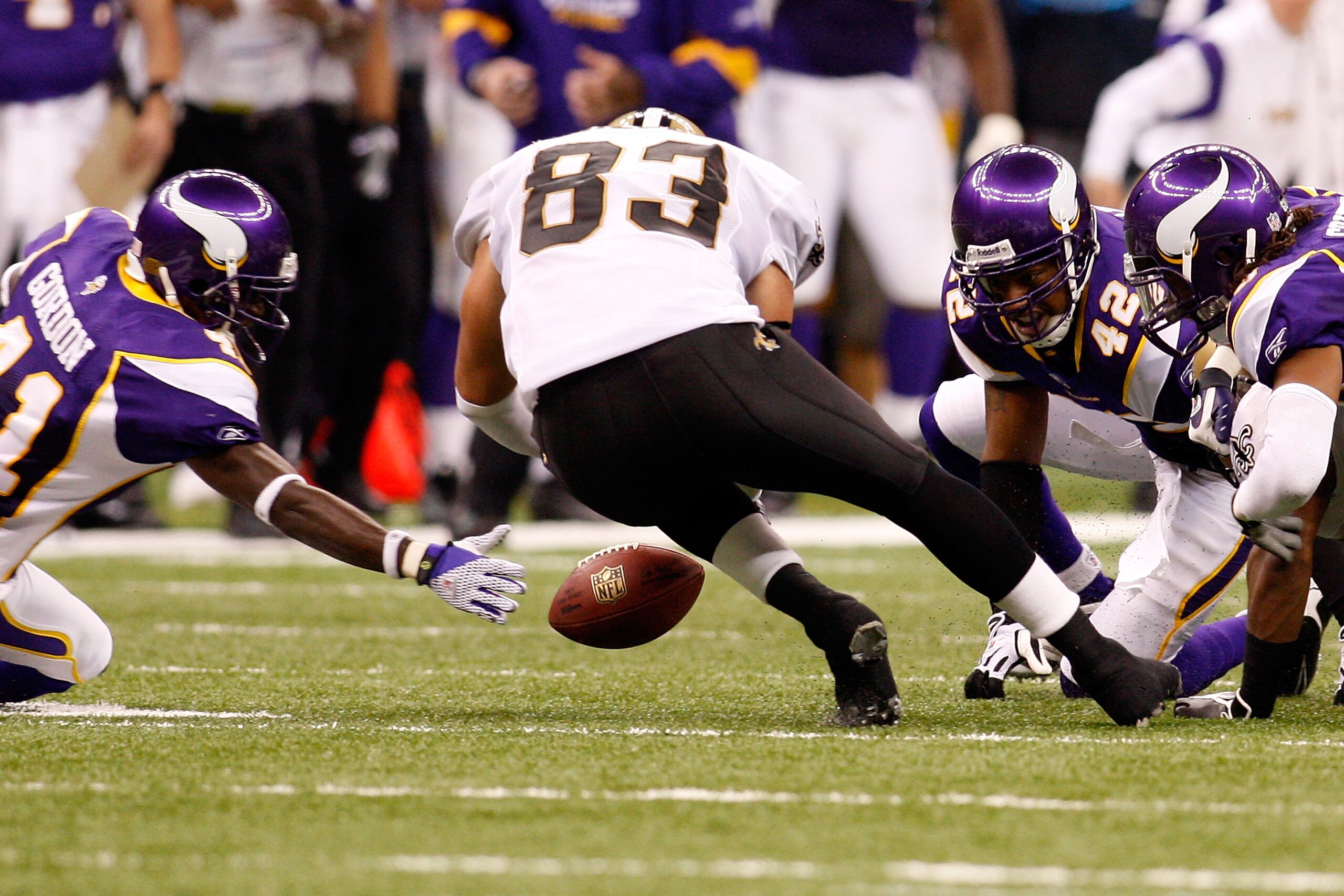 NEW ORLEANS - OCTOBER 06:  Billy Miller #83 of the New Orleans Saints falls on a fumble around the the Minnesota Vikings defense on October 6, 2008 at the Superdome in New Orleans, Louisiana.  (Photo by Chris Graythen/Getty Images)