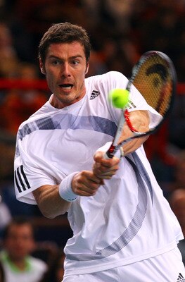 PARIS - NOVEMBER 11:  Marit Safin of Russia in action during his match against Juan Martin Del Potro of Argentina during the ATP Masters Series at the Palais Omnisports De Paris-Bercy on November 11, 2009 in Paris, France.  (Photo by Clive Rose/Getty Imag