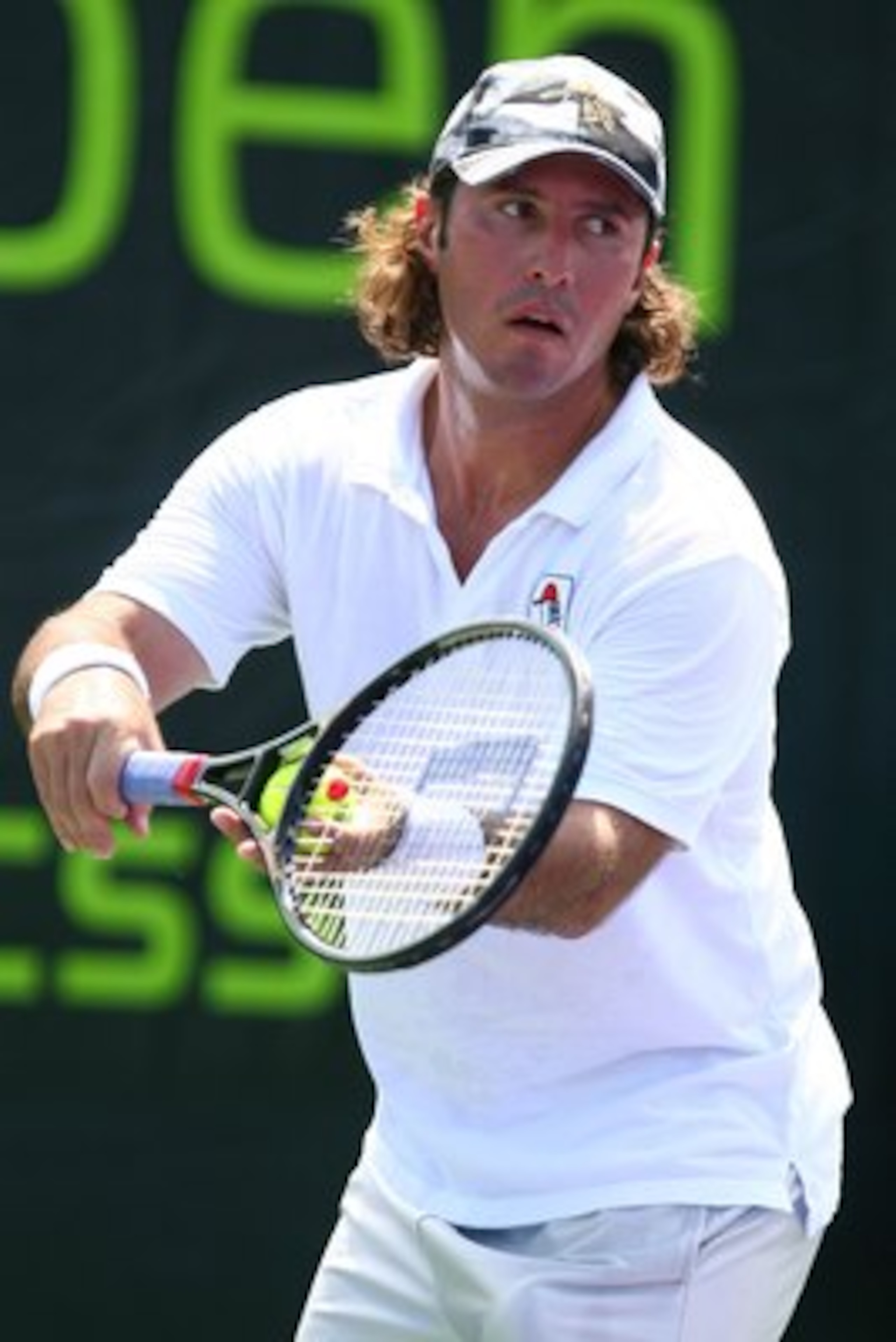 KEY BISCAYNE, FL - MARCH 24:  KEY BISCAYNE, FLORIDA: Vincent Spadea of The United States of America in action against  Ricardo Mello of Brazil during Qualifications for The Sony Ericsson Open at The Crandon Park Tennis Center on March 24, 2009 in Key Bisc
