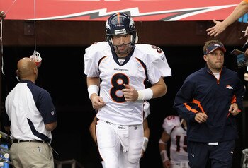 GLENDALE, AZ - DECEMBER 12:  Quarterback Kyle Orton #8 of the Denver Broncos runs out onto the field before the NFL game against the Arizona Cardinals at the University of Phoenix Stadium on December 12, 2010 in Glendale, Arizona.  (Photo by Christian Pet