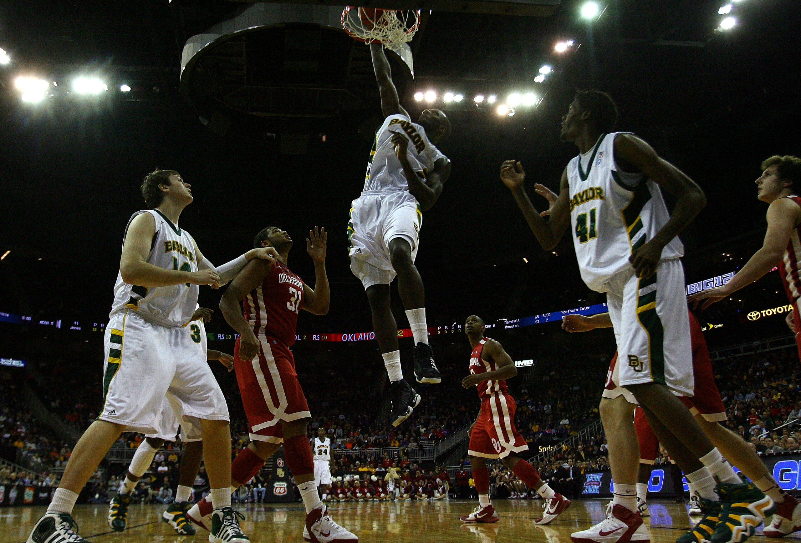 KANSAS CITY, MO - MARCH 09: Quincy Acy #4 of the Baylor Bears dunks the ball against the Oklahoma Sooners during their game in the first round of the 2011 Phillips 66 Big 12 Men's Basketball Tournament at Sprint Center on March 9, 2011 in Kansas City, Mi KANSAS CITY, MO - MARCH 09: Quincy Acy #4 of the Baylor Bears dunks the ball against the Oklahoma Sooners during their game in the first round of the 2011 Phillips 66 Big 12 Men's Basketball Tournament at Sprint Center on March 9, 2011 in Kansas City, Mi