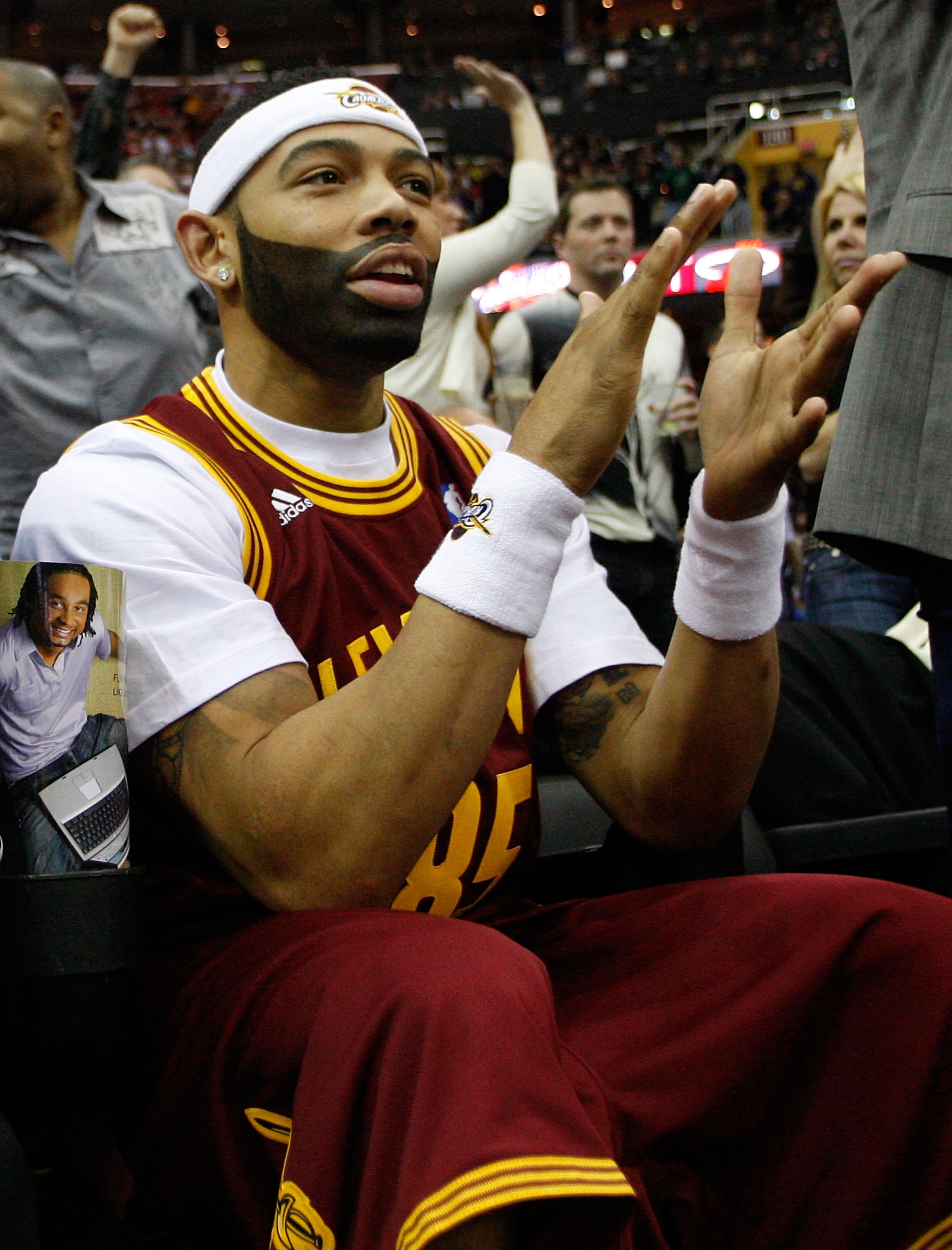 CLEVELAND - MARCH 29: Joe Haden of the Cleveland Browns cheers on the Cleveland Cavaliers during the game against the Miami Heat on March 29, 2011 at Quicken Loans Arena in Cleveland, Ohio. NOTE TO USER: User expressly acknowledges and agrees that, by dow