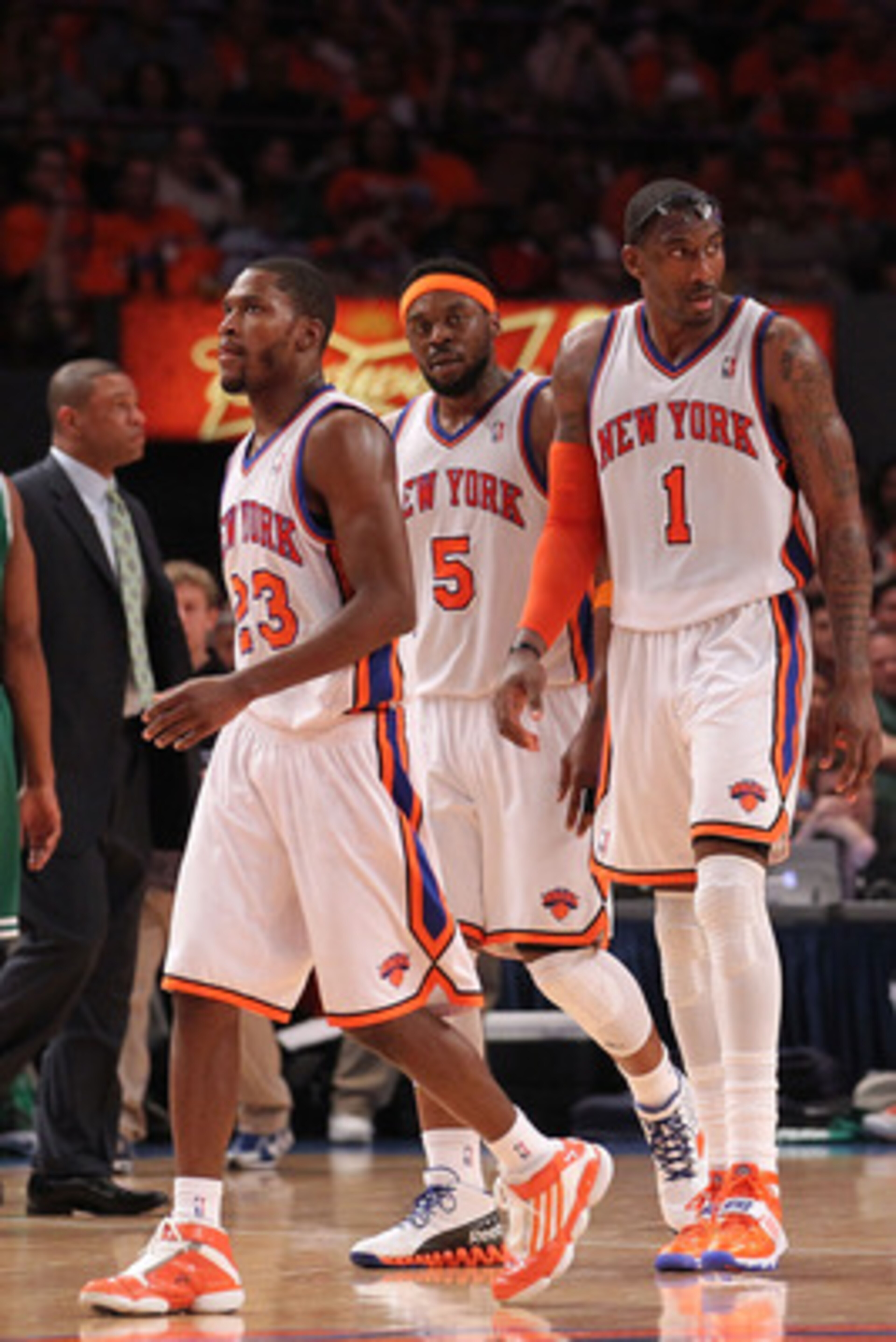 NEW YORK, NY - APRIL 24: (L-R) Toney Douglas #23, Bill Walker and Amar'e Stoudemire #1 of the New York Knicks walk towards the bench against the Boston Celtics in Game Four of the Eastern Conference Quarterfinals during the 2011 NBA Playoffs on April 24, NEW YORK, NY - APRIL 24: (L-R) Toney Douglas #23, Bill Walker and Amar'e Stoudemire #1 of the New York Knicks walk towards the bench against the Boston Celtics in Game Four of the Eastern Conference Quarterfinals during the 2011 NBA Playoffs on April 24,