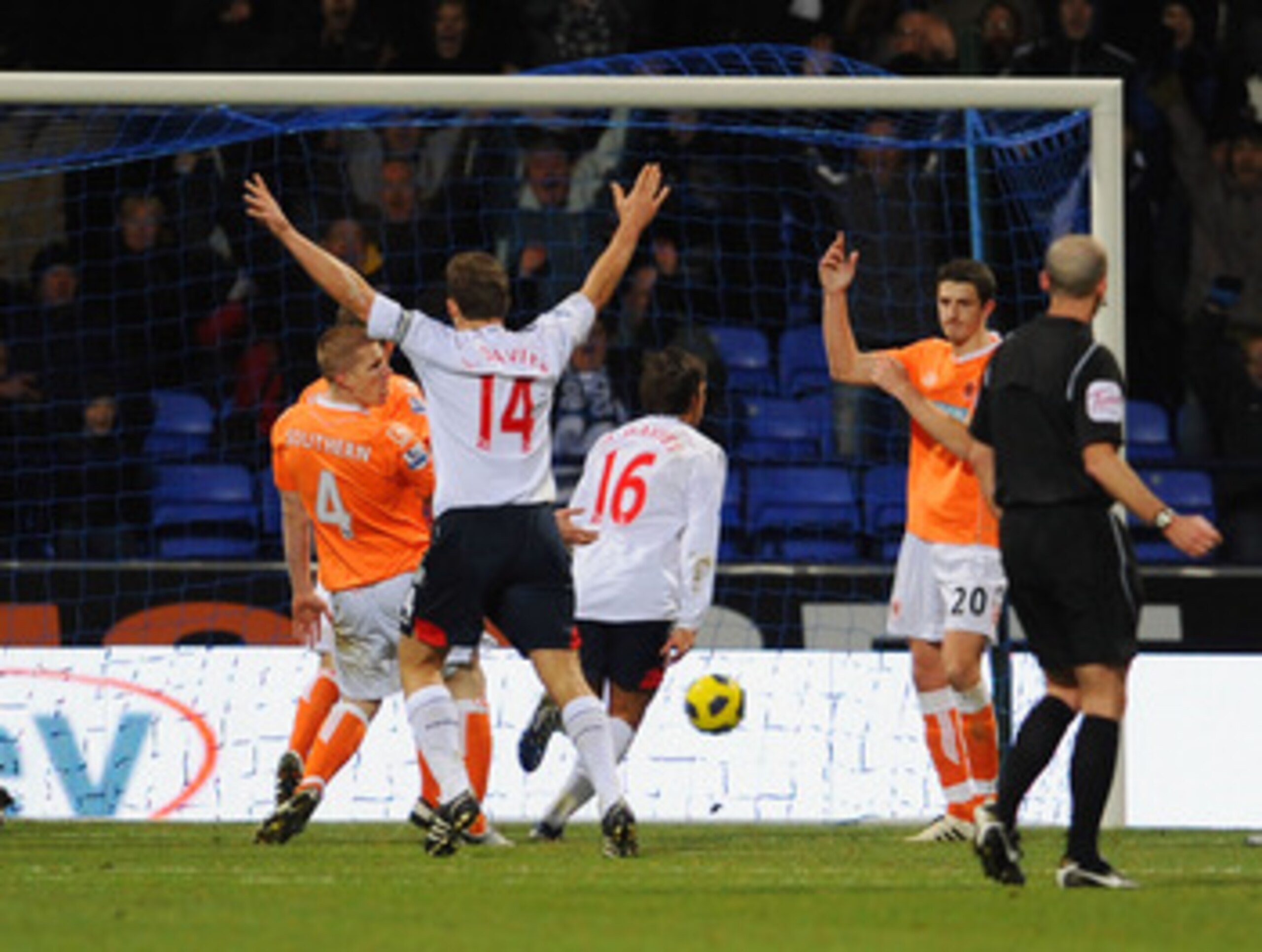 BOLTON, UNITED KINGDOM - NOVEMBER 27: Mark Davies (16) of Bolton celebrates after scoring the second goal for his side during the Barclays Premier League match between Bolton Wanderers and Blackpool at the Reebok Stadium on November 27, 2010 in Bolton, En BOLTON, UNITED KINGDOM - NOVEMBER 27: Mark Davies (16) of Bolton celebrates after scoring the second goal for his side during the Barclays Premier League match between Bolton Wanderers and Blackpool at the Reebok Stadium on November 27, 2010 in Bolton, En