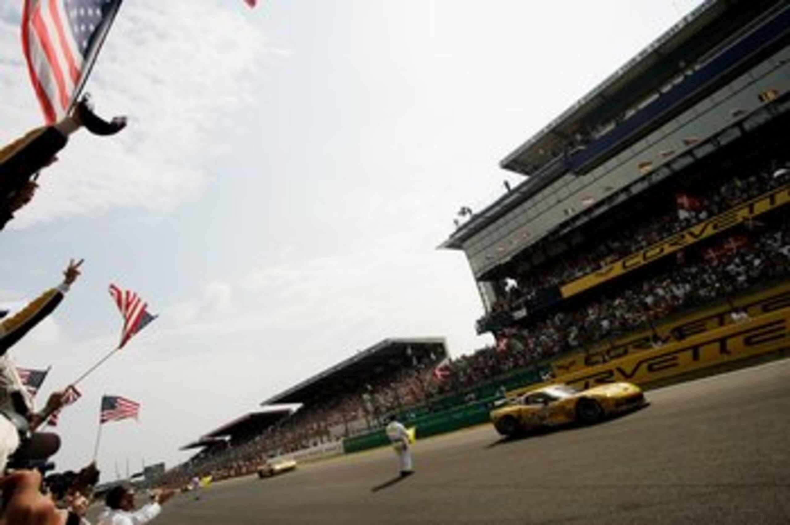LE MANS, FRANCE - JUNE 18:  The Corvette Racing Team celebrate winning LM GT1 class during during the Le Mans 24h race on June 18, 2006 at the Circuit des '24 Heures du Mans' in Le Mans, France.  (Photo by Getty Images)