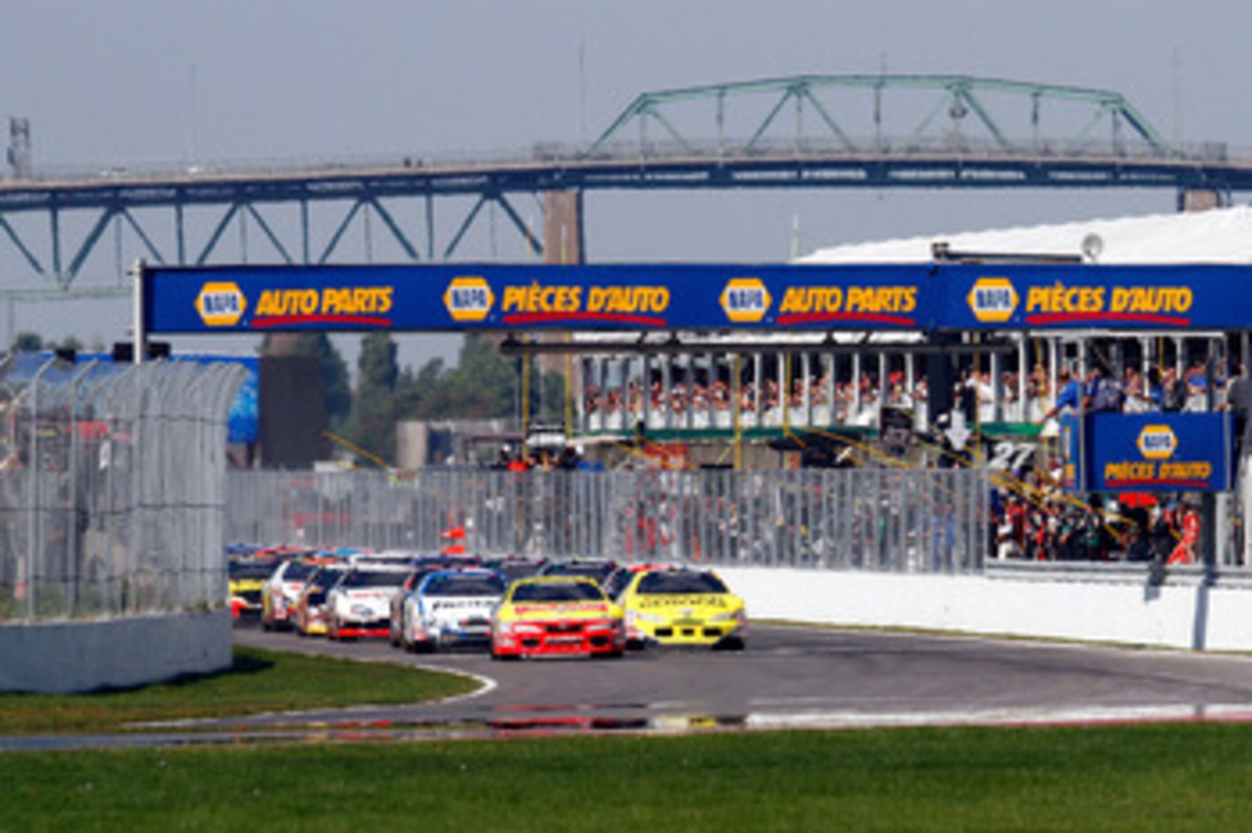 MONTREAL, QC - AUGUST 29:  Marcos Ambrose, driver of the #47 Little Debbie Toyota and Jacques Villeneuve, driver of the #32 Dollar General Toyota, lead the field to the start of the NASCAR Nationwide Series Napa Auto Parts 200 on August 29, 2010 at the Ci