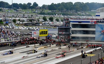 CONCORD, NC - SEPTEMBER 20:  A general view of top fuel dragsters racing four wide as an exhibition during the NHRA Carolinas Nationals on September 20, 2009 at Zmax Dragway in Concord, North Carolina.  (Photo by Rusty Jarrett/Getty Images)
