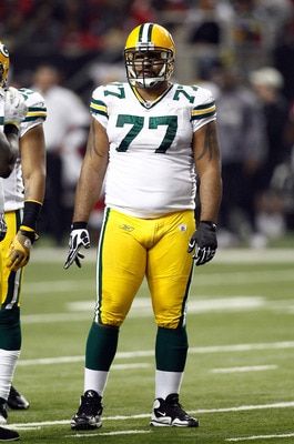 ATLANTA, GA - JANUARY 15:  Cullen Jenkins #77 of the Green Bay Packers looks on against the Atlanta Falcons during their 2011 NFC divisional playoff game at Georgia Dome on January 15, 2011 in Atlanta, Georgia.  (Photo by Chris Graythen/Getty Images)