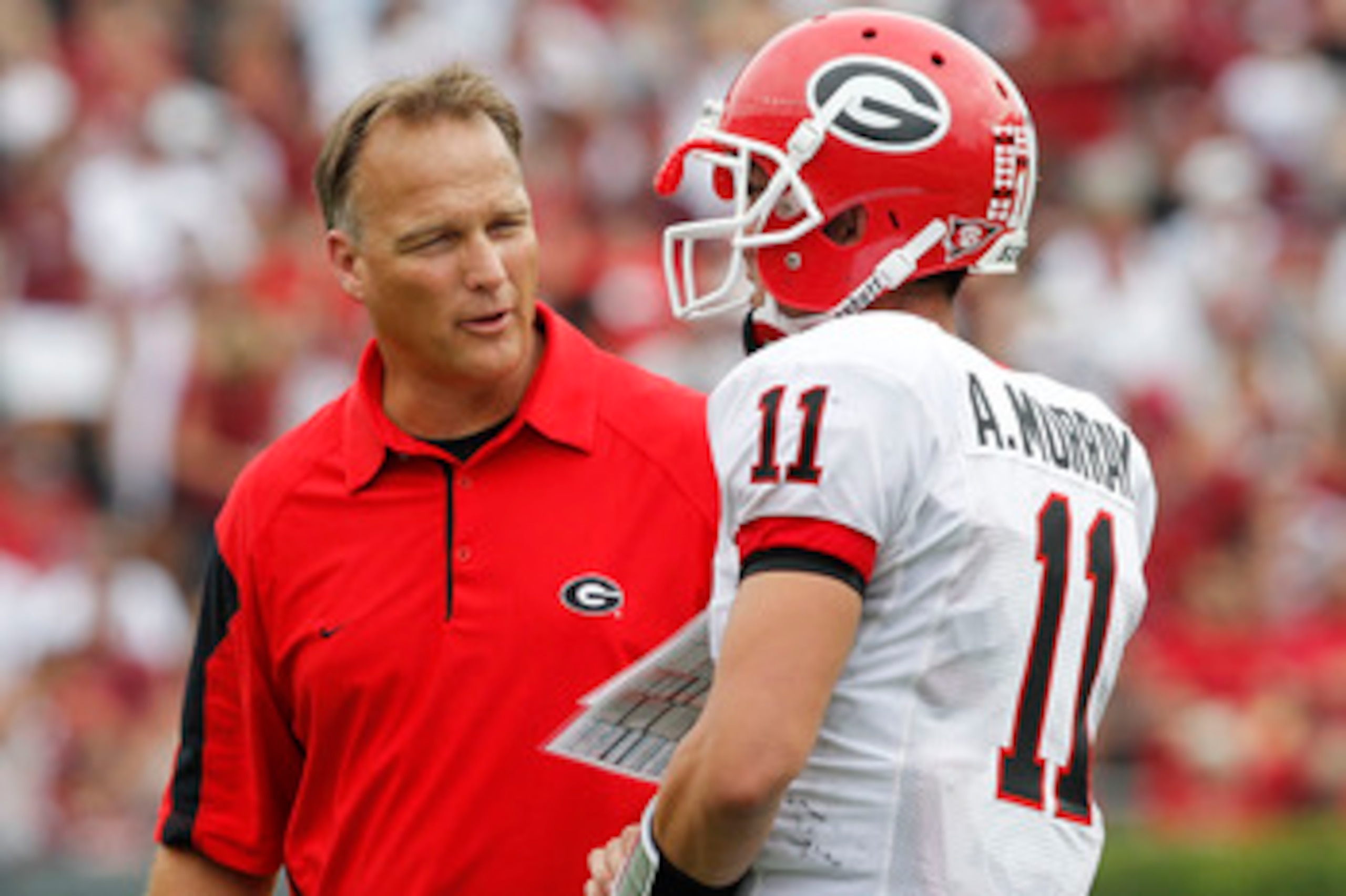 COLUMBIA, SC - SEPTEMBER 11: Head coach Mark Richt of the Georgia Bulldogs speaks with quarterback Aaron Murray #11 during the game against the South Carolina Gamecocks at Williams-Brice Stadium on September 11, 2010 in Columbia, South Carolina. The Gamec