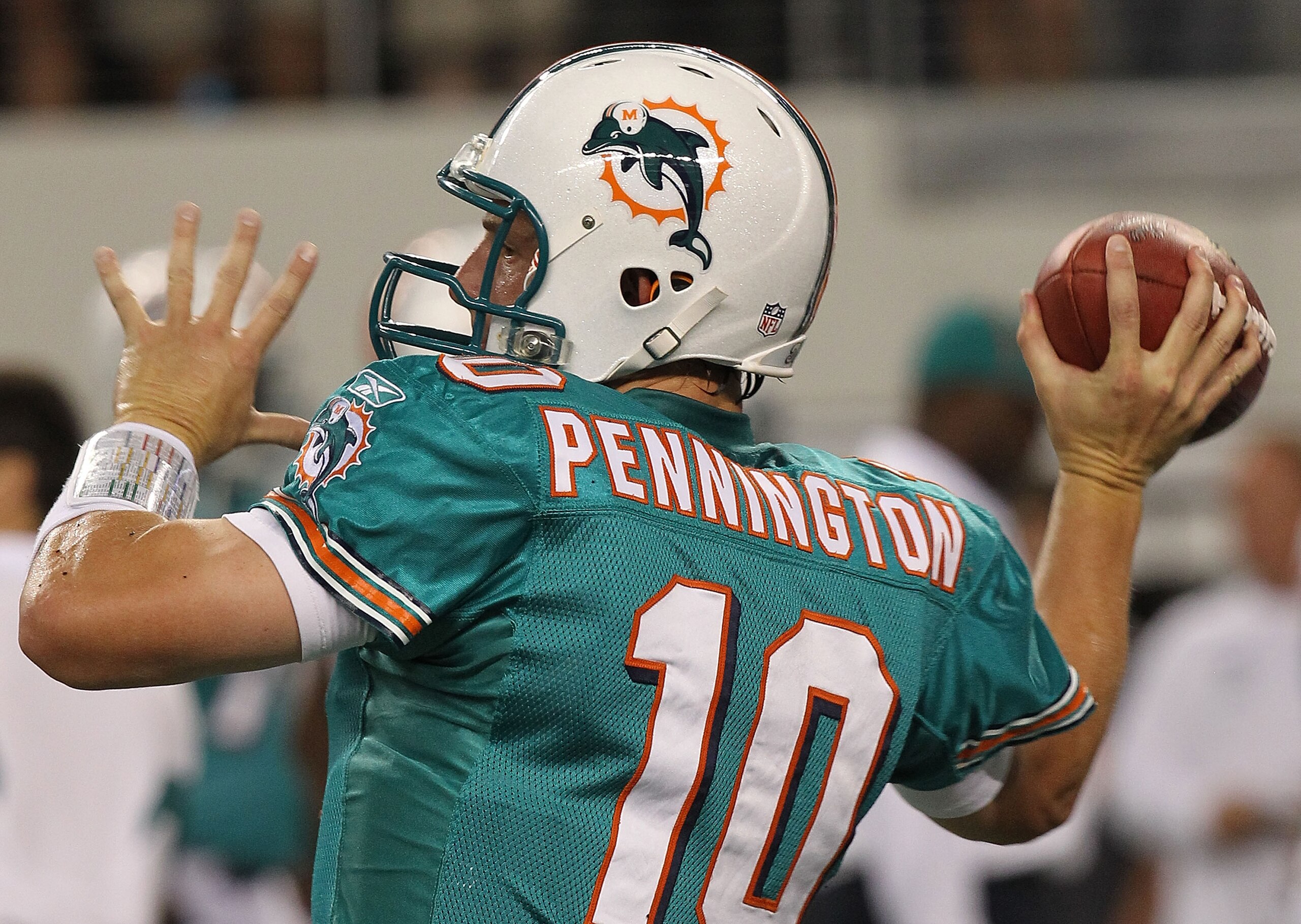 ARLINGTON, TX - SEPTEMBER 02:  Quarterback Chad  Pennington #10 of the Miami Dolphins walks off the field against the Dallas Cowboys during a preseason game at Cowboys Stadium on September 2, 2010 in Arlington, Texas.  (Photo by Ronald Martinez/Getty Imag
