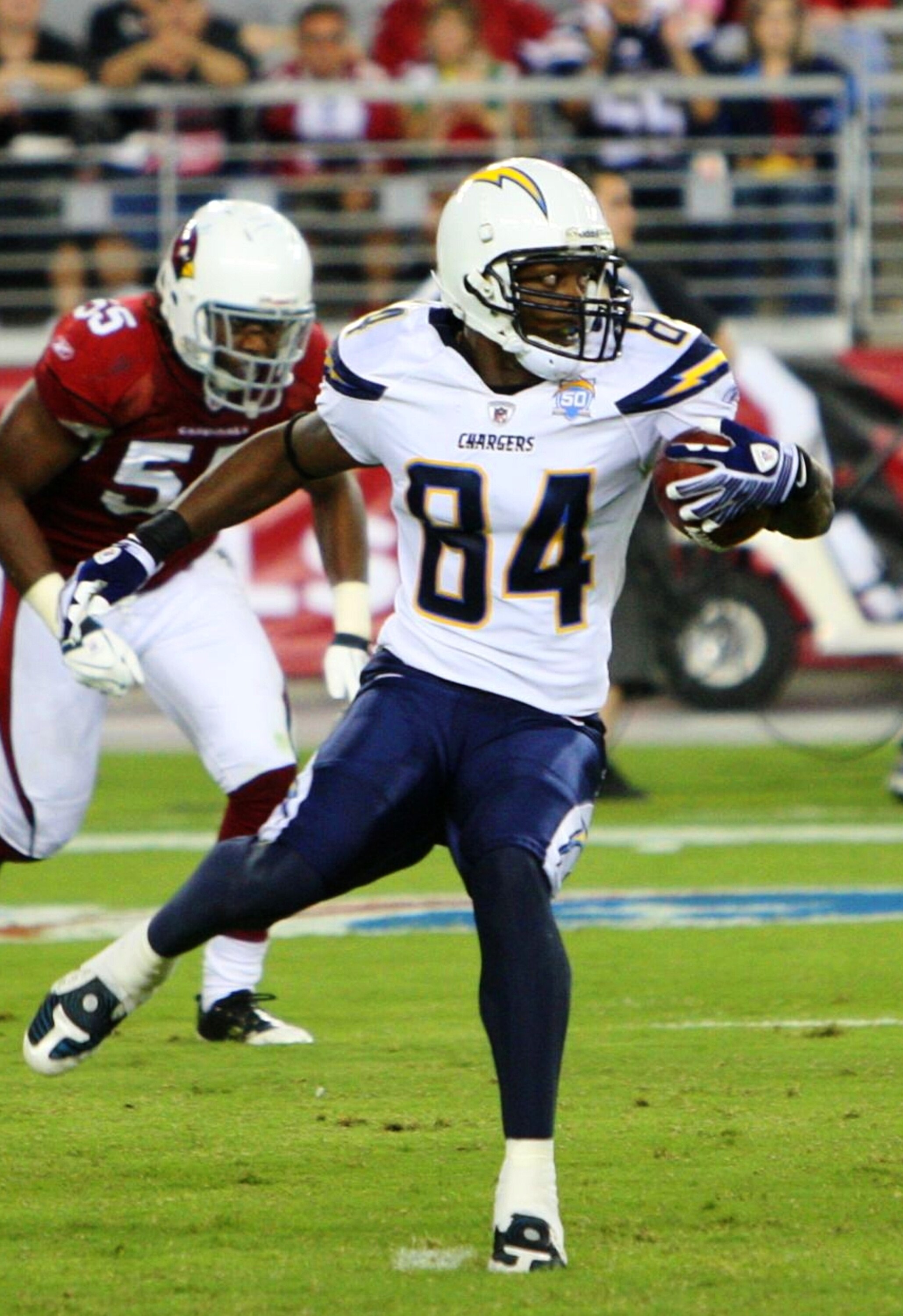 GLENDALE, AZ - AUGUST 22:  Wide Reciever Craig Davis #84 of the San Diego Chargers returns the punt in the third quarter during the game against  the Arizona Cardinals at the University of Phoenix Stadium on August 22, 2009 in Glendale, Arizona. (Photo by