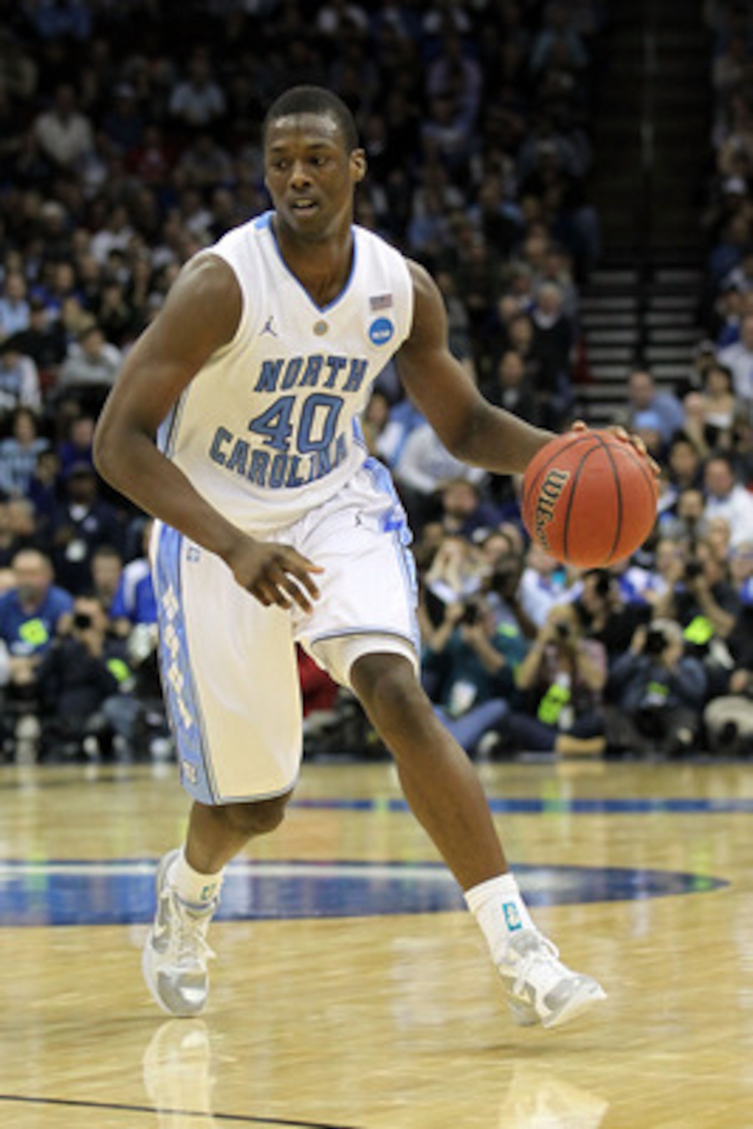 NEWARK, NJ - MARCH 27:  Harrison Barnes #40 of the North Carolina Tar Heels dribbles the ball during the second half of the game against the Kentucky Wildcats in the east regional final of the 2011 NCAA men's basketball tournament at Prudential Center on 