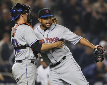 NEW YORK - MAY 20:  Francisco Rodriguez #75 of the New York Mets celebrates with teamate Josh Thole #30 after defetaing the New York Yankees 2-1 on May 20, 2011 at Yankee Stadium in the Bronx borough of New York City.  (Photo by Mike Stobe/Getty Images)