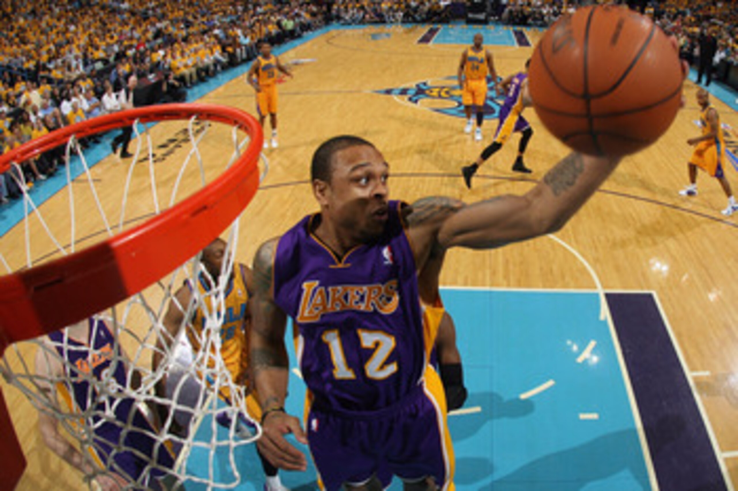 NEW ORLEANS, LA - APRIL 22:  Shannon Brown #12 of the Los Angeles Lakers grabs a rebound during the game against the New Orleans Hornets in Game Three of the Western Conference Quarterfinals in the 2011 NBA Playoffs at the New Orleans Arena  on April 22, 