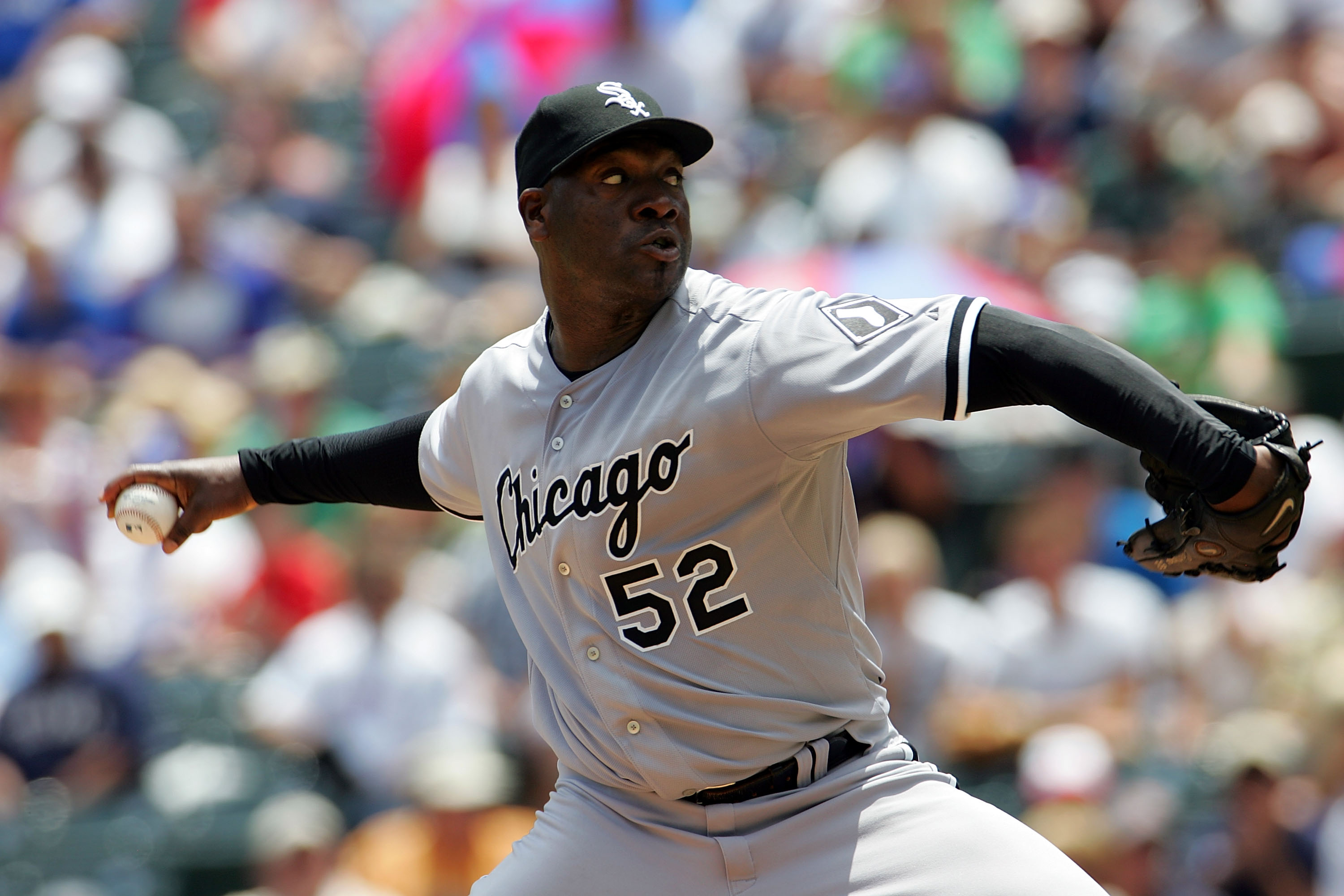 ARLINGTON, TX - JULY 13:  Pitcher Jose Contreras #52 of the Chicago White Sox throws against the Texas Rangers in the first inning on July 13, 2008 at Rangers Ballpark in Arlington, Texas.  (Photo by Ronald Martinez/Getty Images)