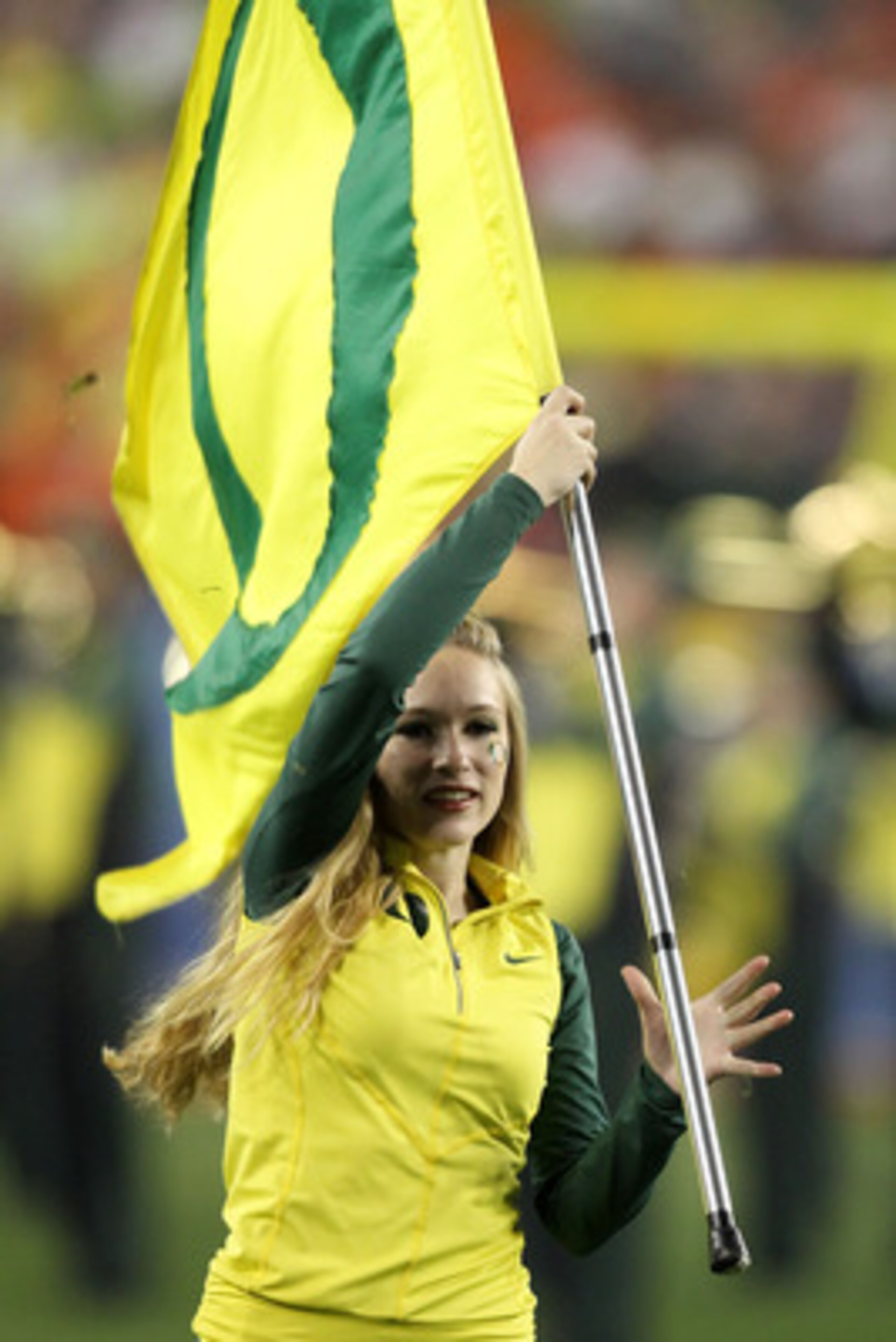 GLENDALE, AZ - JANUARY 10:  The Oregon Ducks marching band performs at halftime while taking on the Auburn Tigers in the Tostitos BCS National Championship Game at University of Phoenix Stadium on January 10, 2011 in Glendale, Arizona.  (Photo by Jonathan