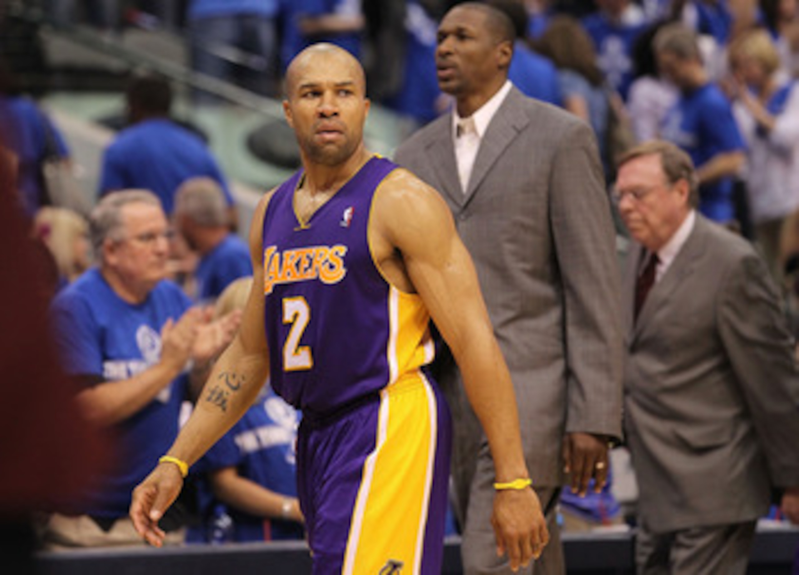 DALLAS, TX - MAY 06:  Guard Derek Fisher #2 of the Los Angeles Lakers leaves the court after a 98-92 loss against the Dallas Mavericks in Game Three of the Western Conference Semifinals during the 2011 NBA Playoffs on May 6, 2011 at American Airlines Cent