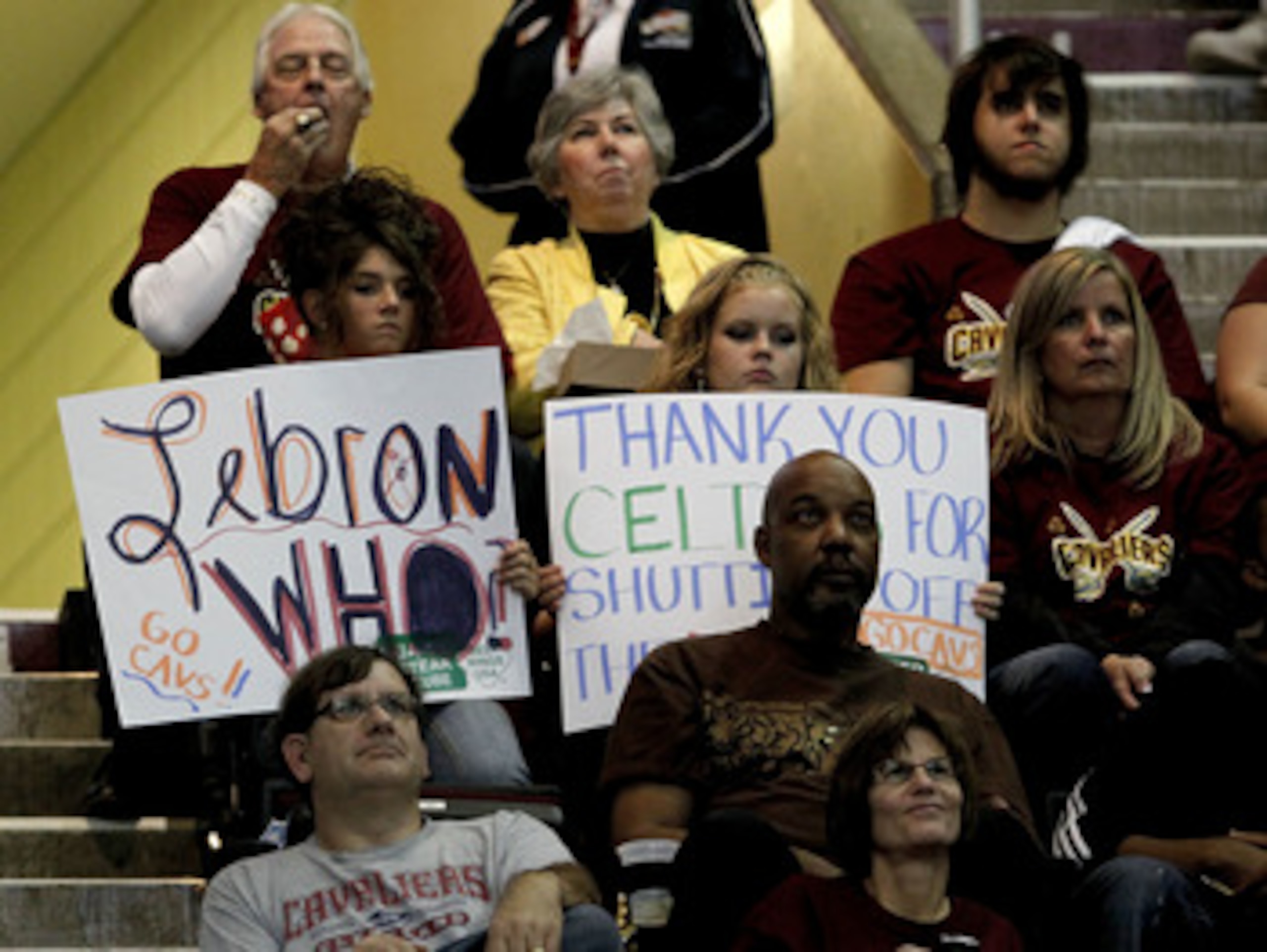 CLEVELAND - OCTOBER 27:  Fans of the Cleveland Cavaliers hold up signs expressing their thoughts about LeBron James while playing the Boston Celtics at Quicken Loans Arena on October 27, 2010 in Cleveland, Ohio.  (Photo by Gregory Shamus/Getty Images)