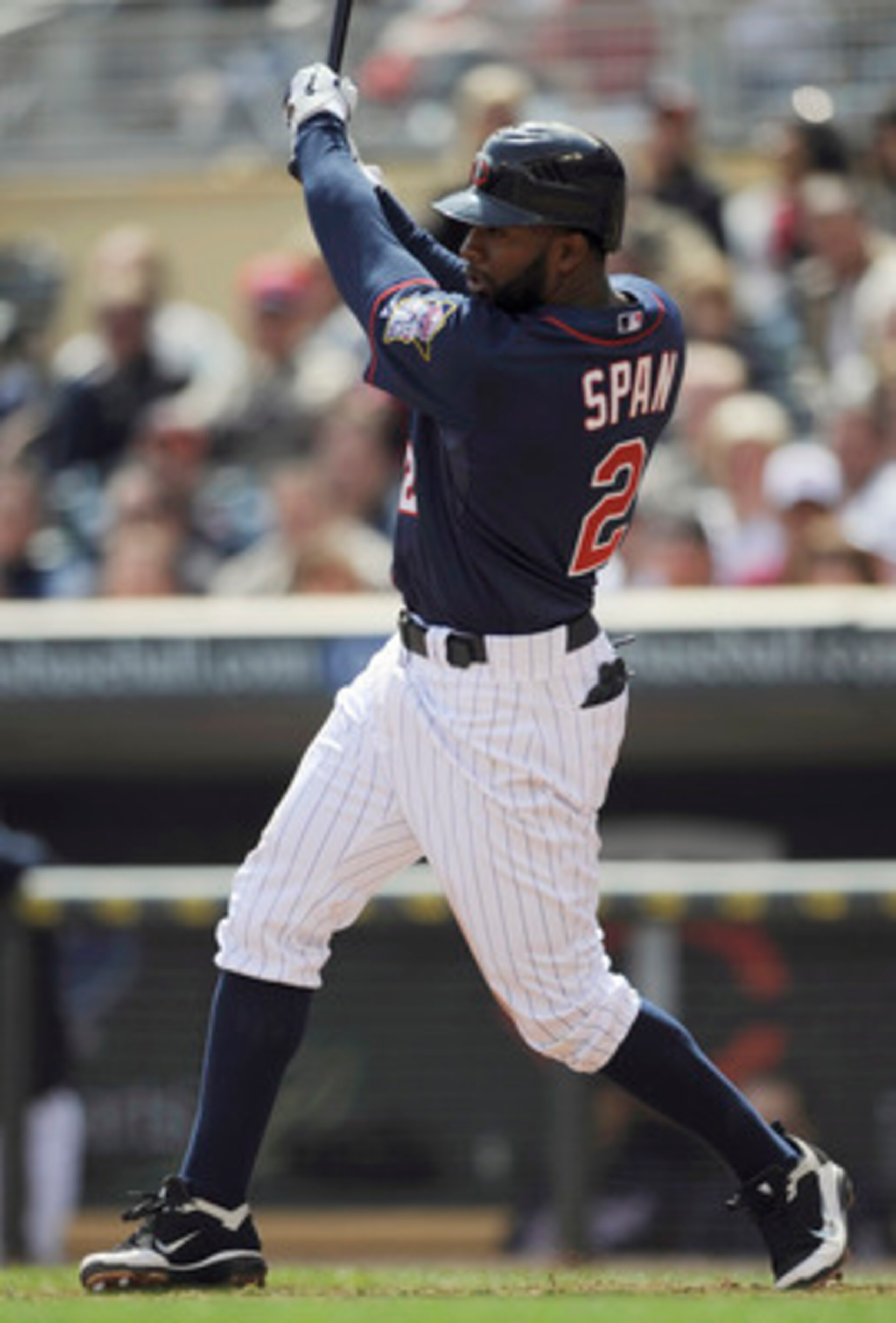 MINNEAPOLIS, MN - APRIL 13: Denard Span #2 of the Minnesota Twins singles against the Kansas City Royals during the fifth inning of their game on April 13, 2011 at Target Field in Minneapolis, Minnesota. (Photo by Hannah Foslien/Getty Images) MINNEAPOLIS, MN - APRIL 13: Denard Span #2 of the Minnesota Twins singles against the Kansas City Royals during the fifth inning of their game on April 13, 2011 at Target Field in Minneapolis, Minnesota. (Photo by Hannah Foslien/Getty Images)
