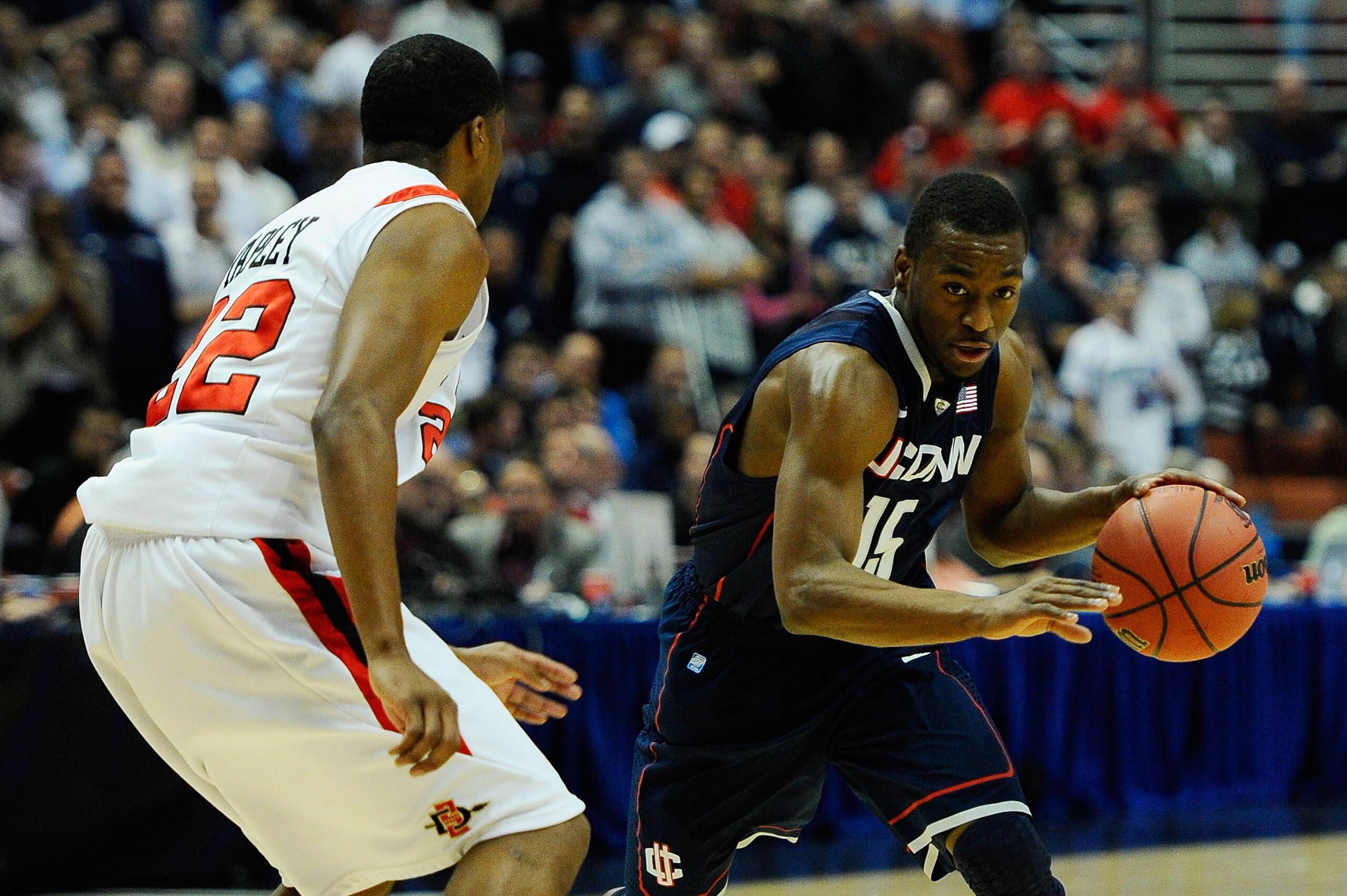 ANAHEIM, CA - MARCH 24:  Kemba Walker #15 of the Connecticut Huskies handles the ball against Chase Tapley #22 of the San Diego State Aztecs during the west regional semifinal of the 2011 NCAA men's basketball tournament at the Honda Center on March 24, 2