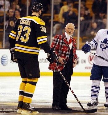 BOSTON - MARCH 04:  Don Cherry drops the puck during the ceremonial face off as Francois Beauchemin #22 of the Toronto Maple Leafs Zdeno Chara #33 of the Boston Bruins stand by on March 4, 2010 at the TD Garden in Boston, Massachusetts.  (Photo by Elsa/Ge