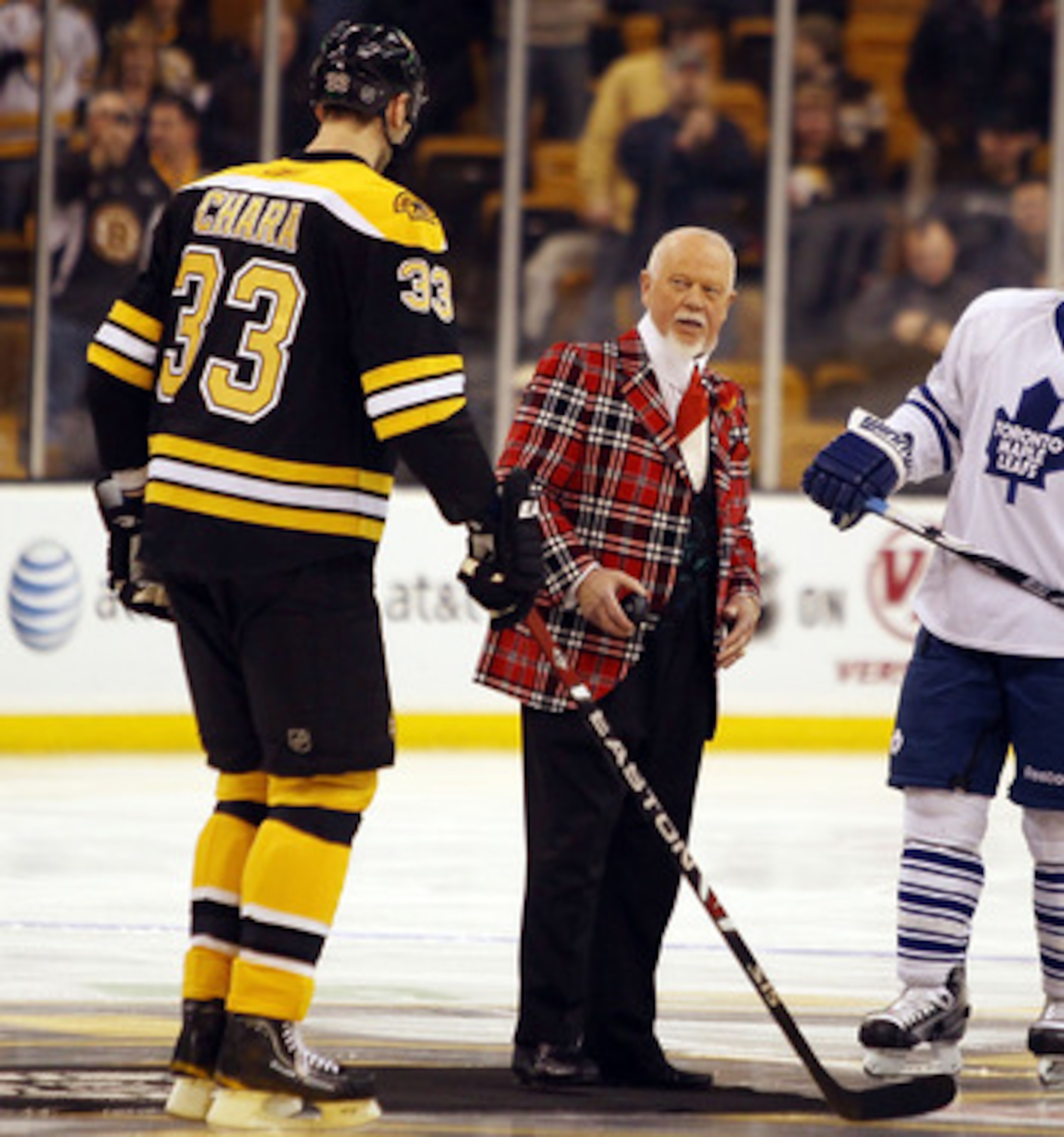 BOSTON - MARCH 04:  Don Cherry drops the puck during the ceremonial face off as Francois Beauchemin #22 of the Toronto Maple Leafs Zdeno Chara #33 of the Boston Bruins stand by on March 4, 2010 at the TD Garden in Boston, Massachusetts.  (Photo by Elsa/Ge
