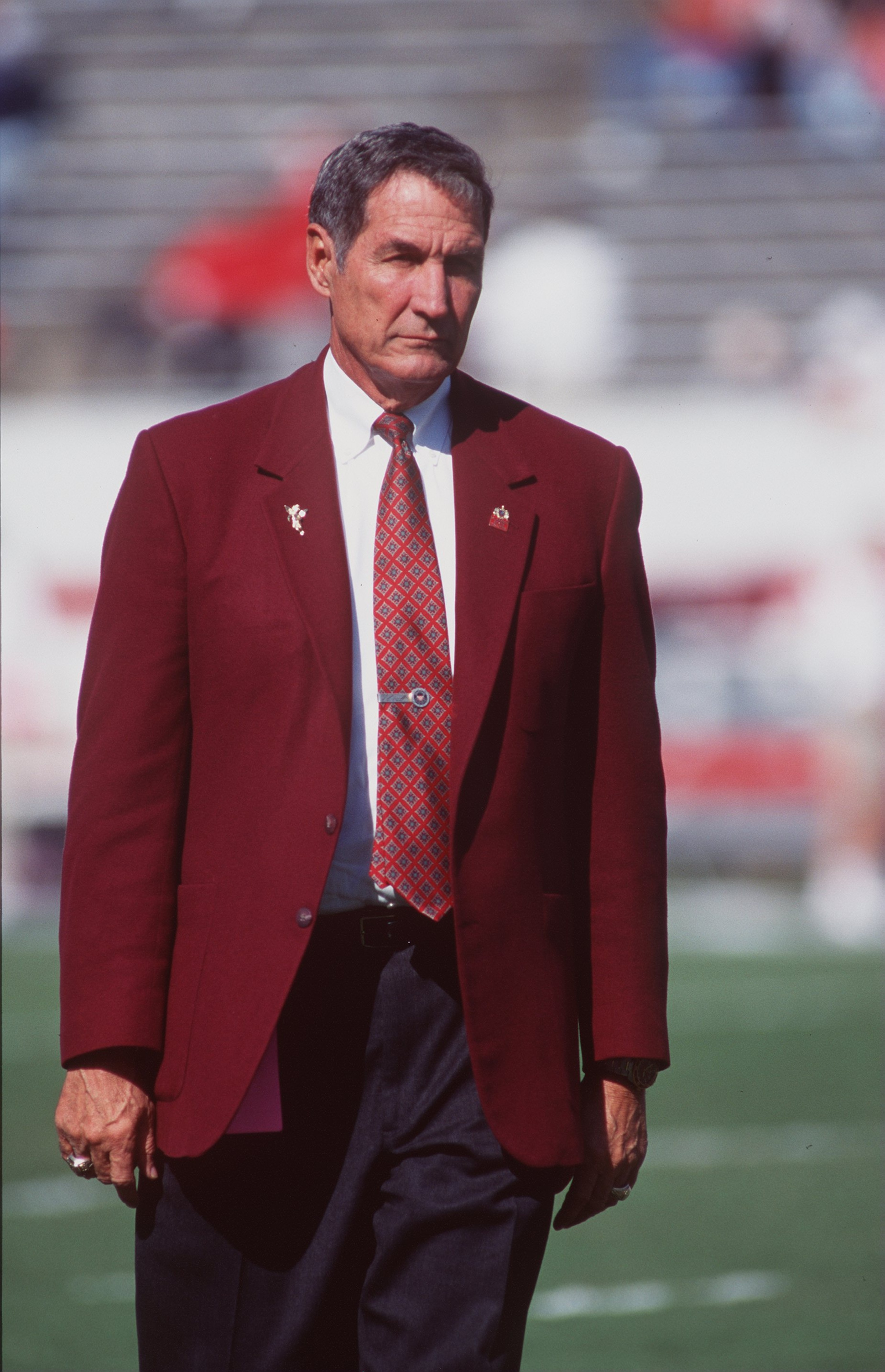 12 Oct 1996:  Head coach Gene Stallings of the Alabama Crimson Tide looks on from mid field as he watches his team warm up during pre game preparations before the start of the Tide's 24-19 victory over the North Carolina State Wolfpack at Cater Finley Sta