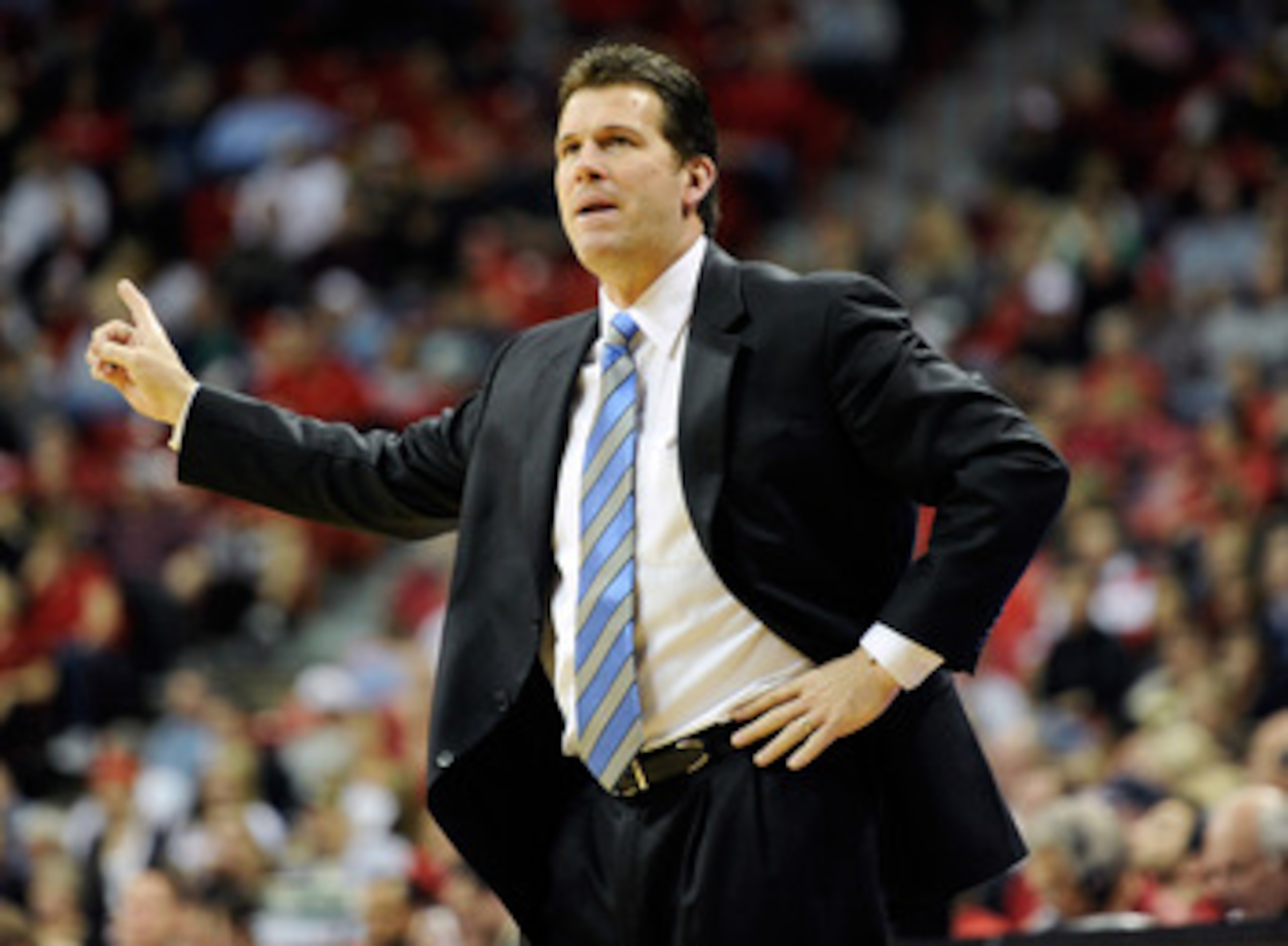 LAS VEGAS, NV - JANUARY 22:  Head coach Steve Alford of the New Mexico Lobos signals his players during their game against the UNLV Rebels at the Thomas & Mack Center January 22, 2011 in Las Vegas, Nevada. UNLV won 63-62.  (Photo by Ethan Miller/Getty Ima