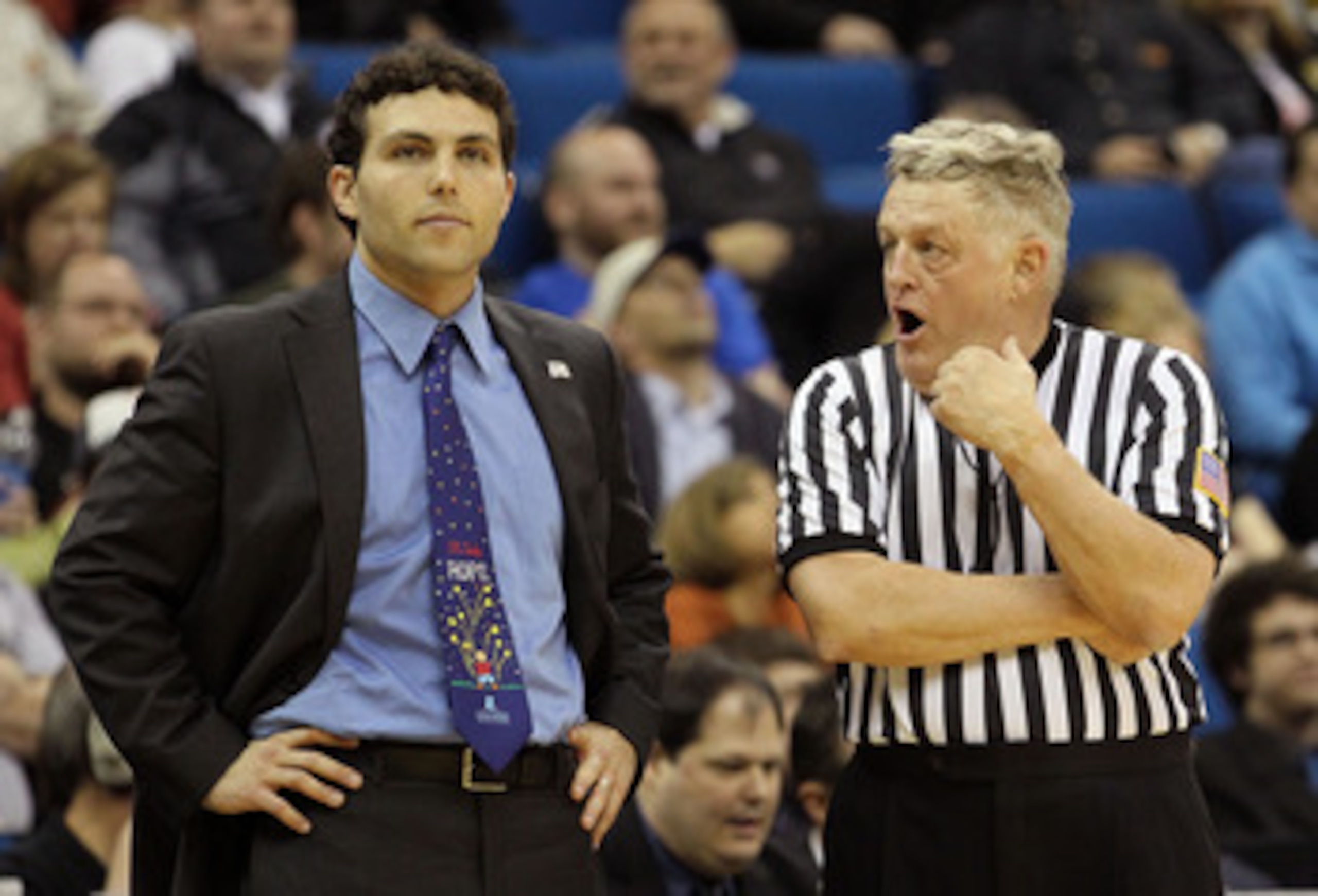 TULSA, OK - MARCH 18:  Head coach Josh Pastner of the Memphis Tigers speaks with a referee during the second round game against the Arizona Wildcats in the 2011 NCAA men's basketball tournament at BOK Center on March 18, 2011 in Tulsa, Oklahoma.  (Photo b