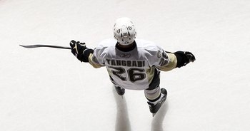 UNIONDALE, NY - FEBRUARY 11:  Eric Tangradi #26 of the Pittsburgh Penguins warms up before playing against the New York Islanders on February 11, 2011 at Nassau Coliseum in Uniondale, New York.  (Photo by Jim McIsaac/Getty Images)