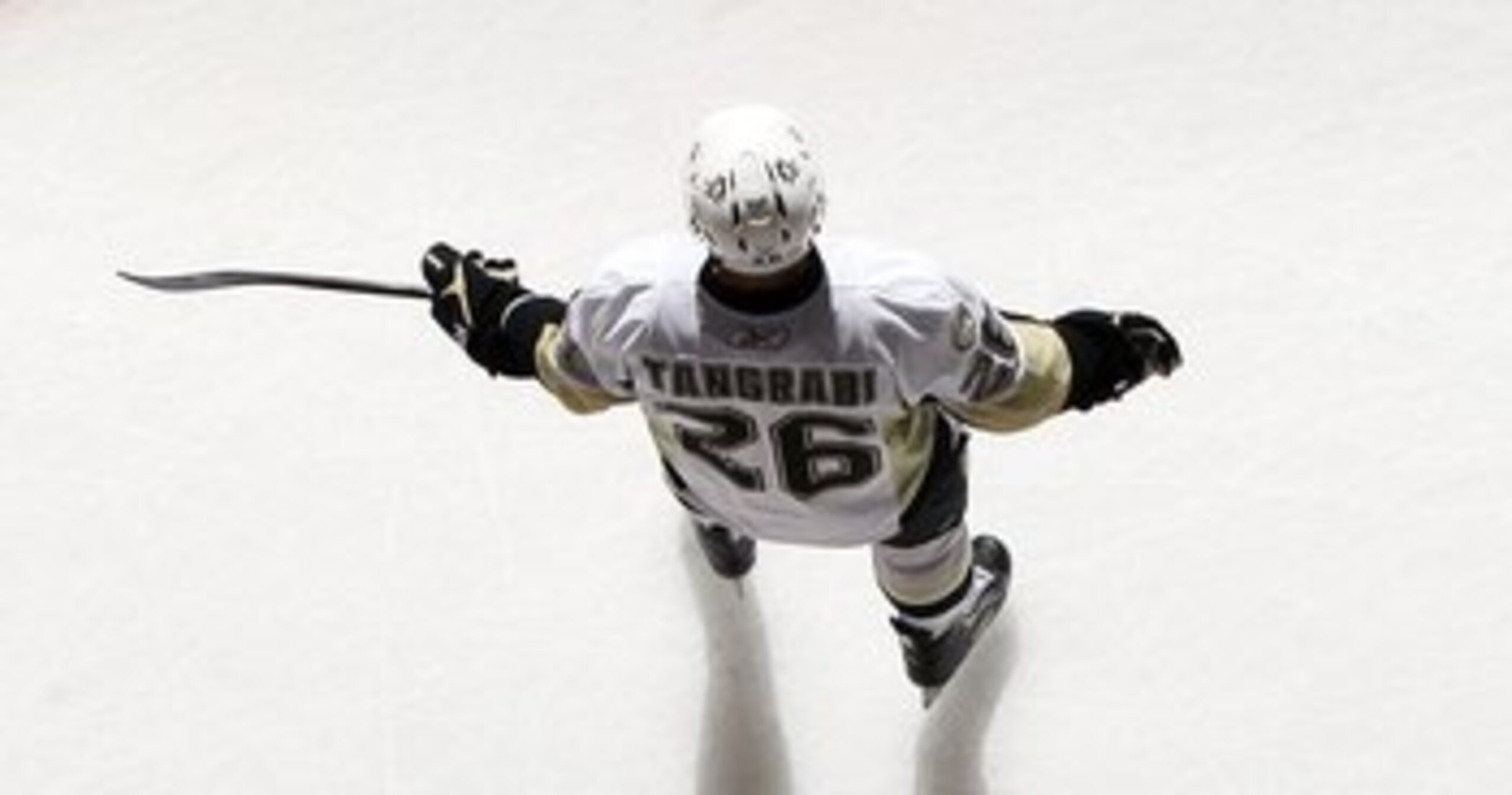 UNIONDALE, NY - FEBRUARY 11:  Eric Tangradi #26 of the Pittsburgh Penguins warms up before playing against the New York Islanders on February 11, 2011 at Nassau Coliseum in Uniondale, New York.  (Photo by Jim McIsaac/Getty Images)
