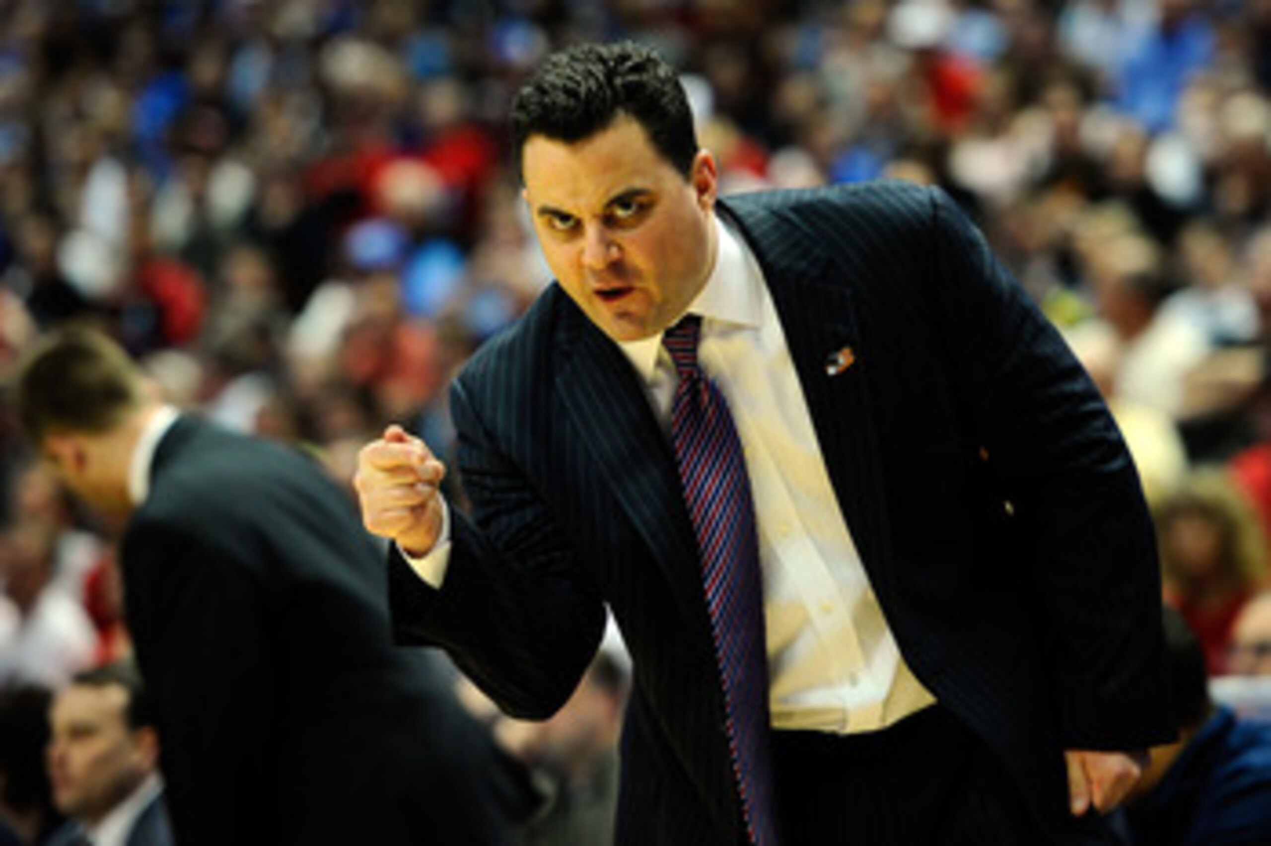 ANAHEIM, CA - MARCH 24:  Head coach Sean Miller of the Arizona Wildcats gestures from the sidelines against the Duke Blue Devils during the west regional semifinal of the 2011 NCAA men's basketball tournament at the Honda Center on March 24, 2011 in Anahe