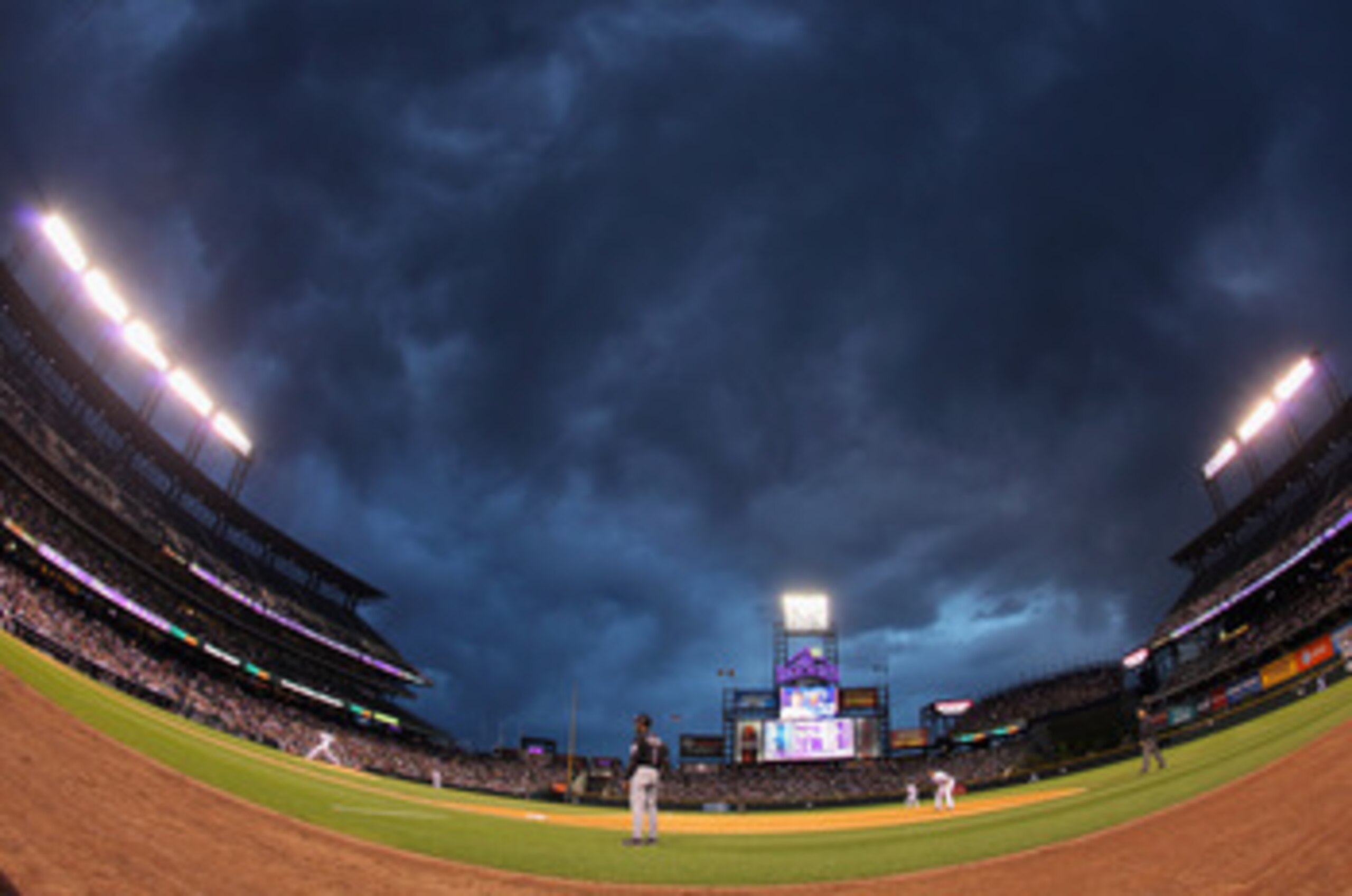 DENVER, CO - MAY 10:  Dramatic skies loom over the stadium as the sun sets as the New York Mets face the Colorado Rockies at Coors Field on May 10, 2011 in Denver, Colorado.  (Photo by Doug Pensinger/Getty Images)