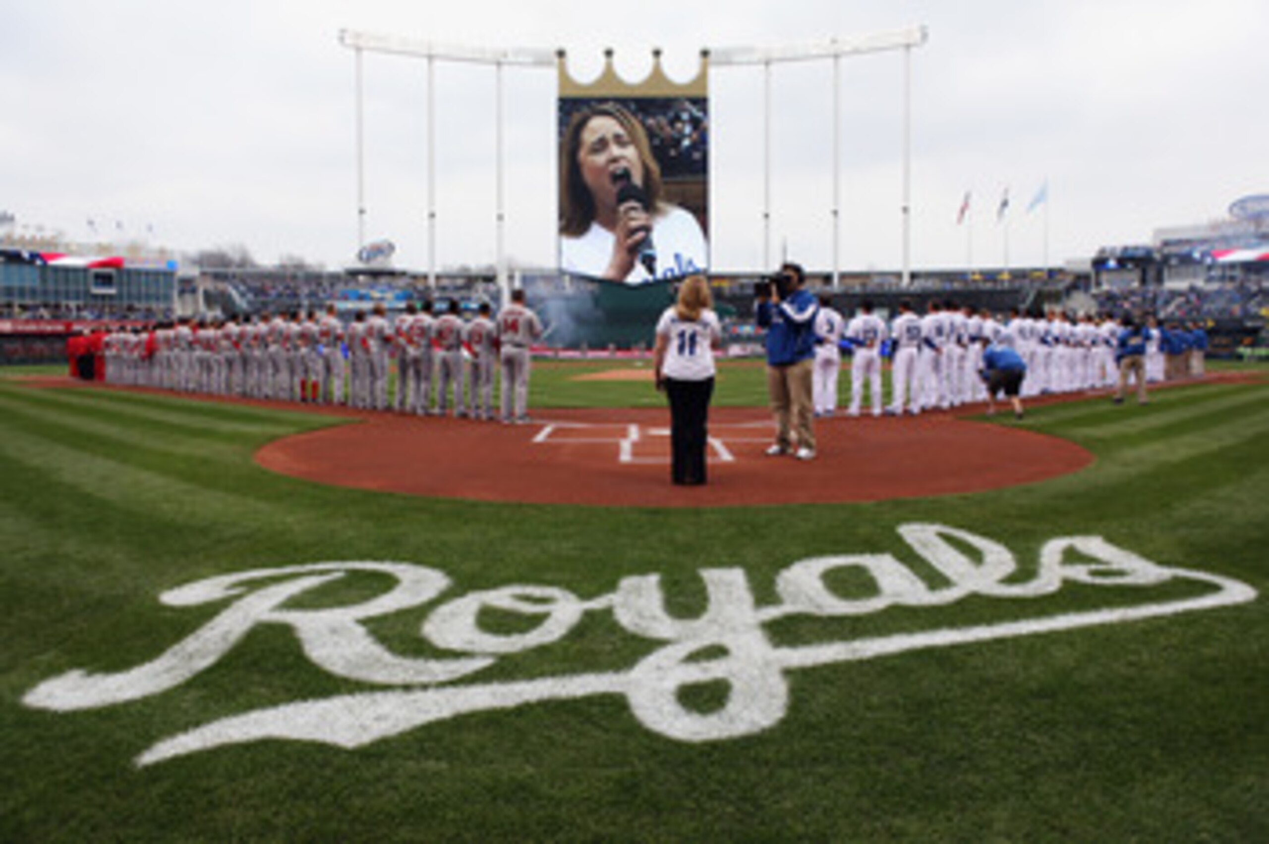 KANSAS CITY, MO - MARCH 31:  Tina Maddigan performs the National Anthem prior to the start of the opening day game between the Los Angeles Angels of Anaheim and the Kansas City Royals at Kauffman Stadium on March 31, 2011 in Kansas City, Missouri.  (Photo