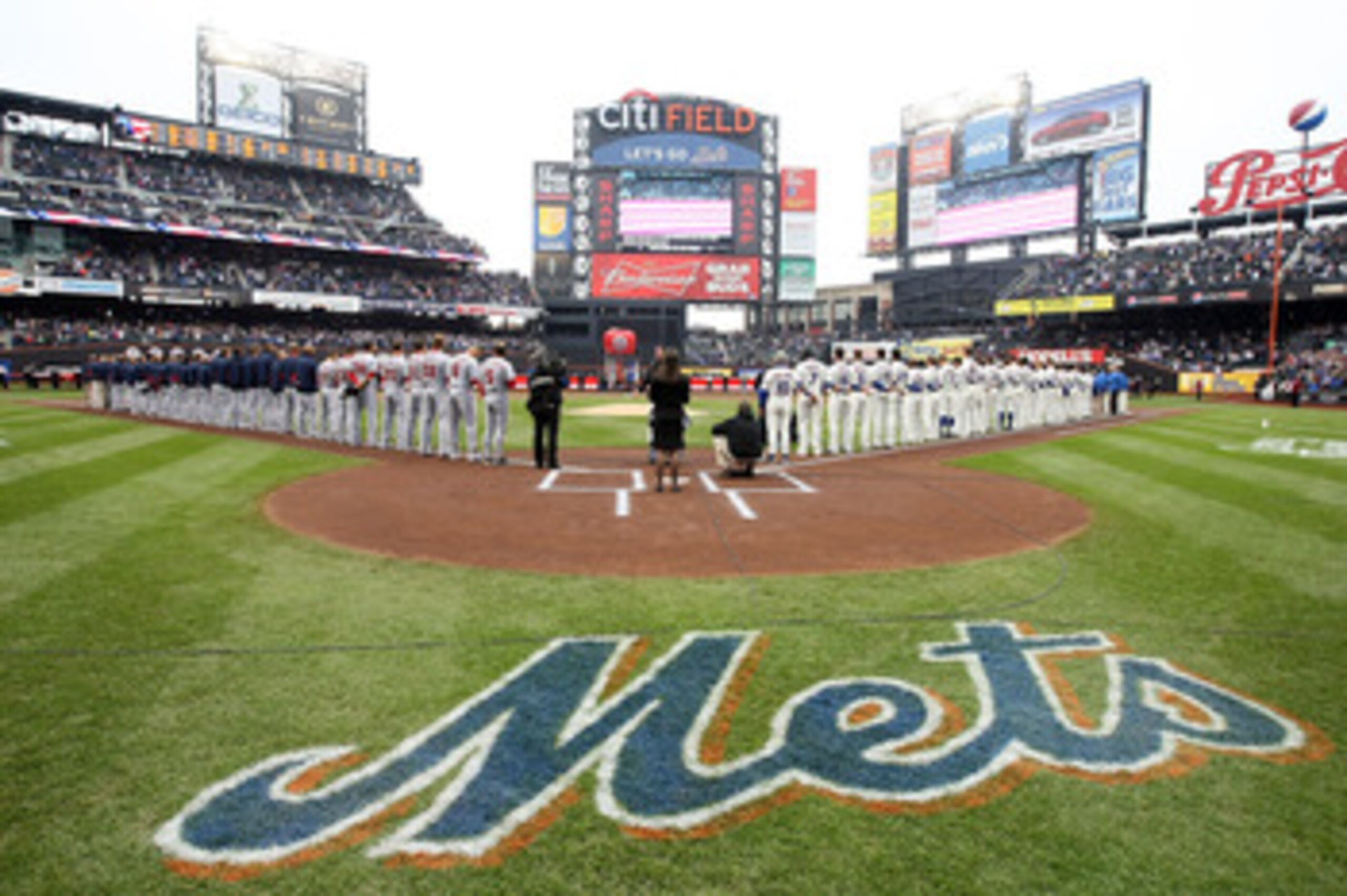 NEW YORK, NY - APRIL 08:  Singer Michael Amante performs the National Anthem prior to the New York Mets playing against the Washington Nationals during the Mets' Home Opener at Citi Field on April 8, 2011 in the Flushing neighborhood of Queens in New York