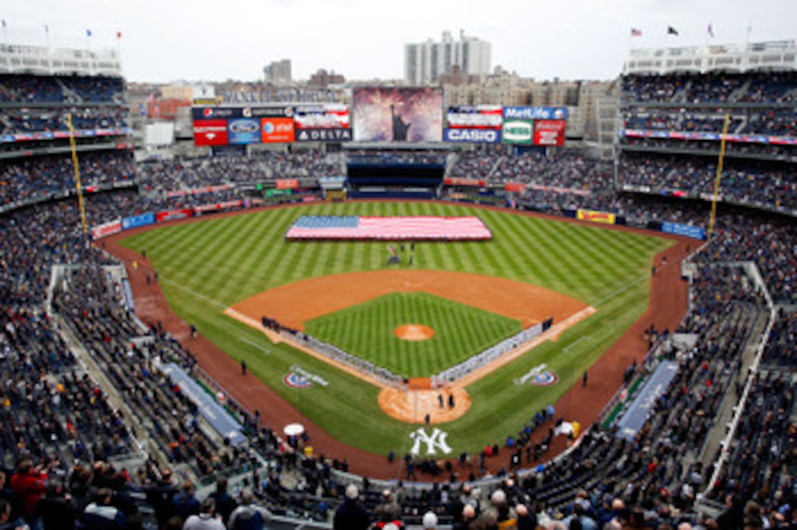 NEW YORK, NY - MARCH 31:  The National Anthem is performed by Haley Swindal as the US Navy Super Hornet flyover takes place before the New York Yankees face the Detroit Tigers on Opening Day at Yankee Stadium on March 31, 2011 in the Bronx borough of New 