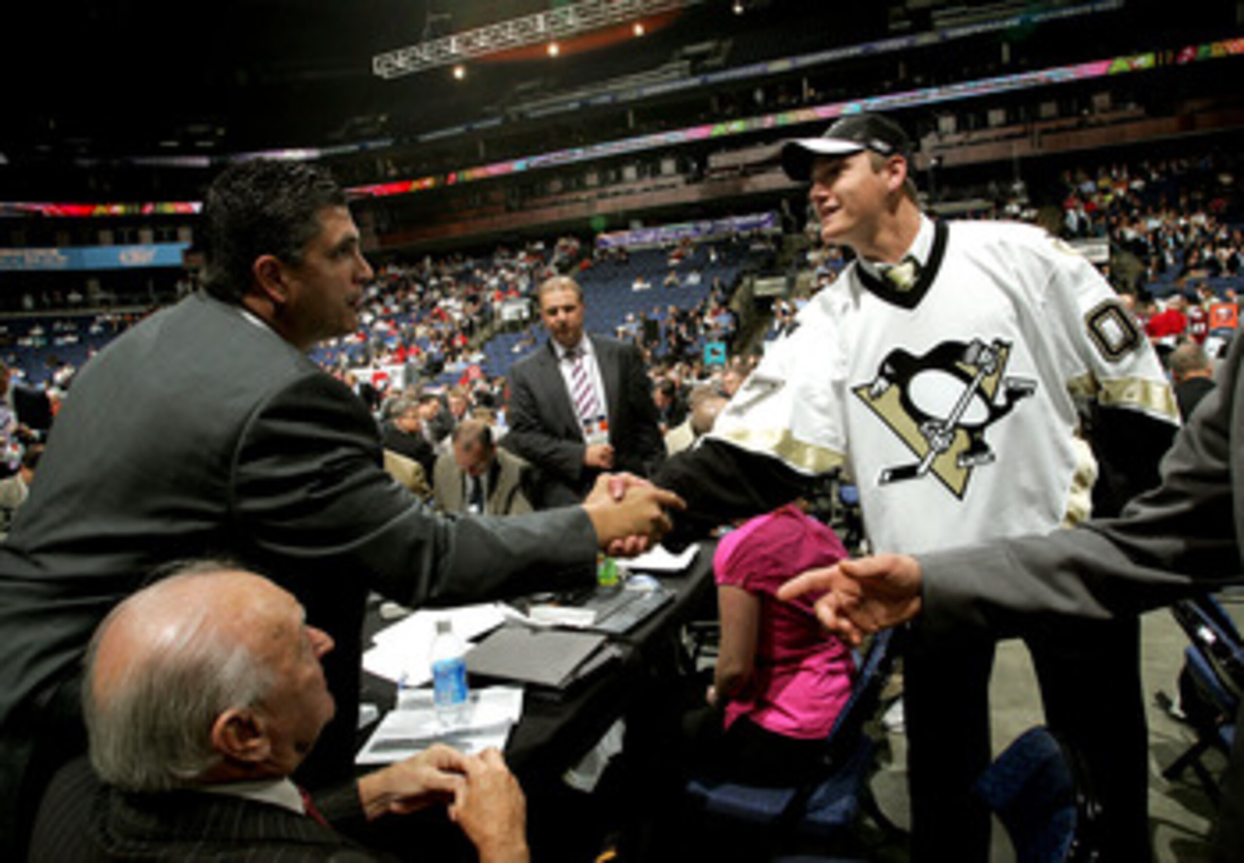 COLUMBUS, OH - JUNE 23:  51st overall pick Keven Veilleux of the Pittsburgh Penguins greets Kevin Stevens after being drafted in the 2007 NHL Entry Draft at Nationwide Arena on June 23, 2007 in Columbus, Ohio.  (Photo by Bruce Bennett/Getty Images)