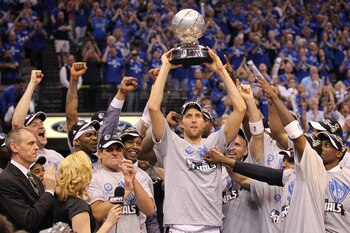 DALLAS, TX - MAY 25:  Dirk Nowitzki #41 and the Dallas Mavericks celebrate their 100-96 victory against the Oklahoma City Thunder in Game Five of the Western Conference Finals during the 2011 NBA Playoffs at American Airlines Center on May 25, 2011 in Dal