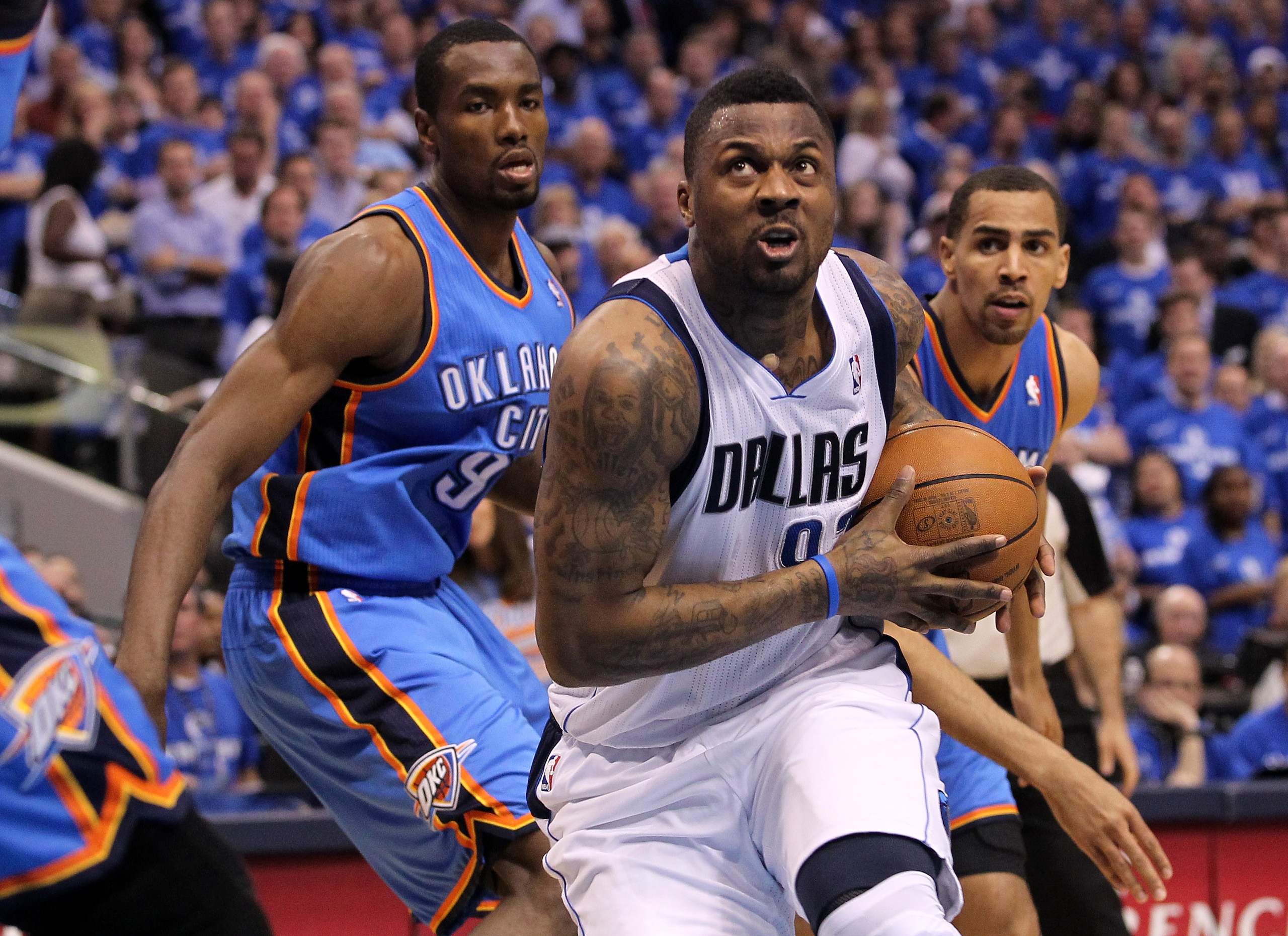 DALLAS, TX - MAY 25:  DeShawn Stevenson #92 of the Dallas Mavericks drives past Serge Ibaka #9 and Thabo Sefolosha #2 of the Oklahoma City Thunder in the first half in Game Five of the Western Conference Finals during the 2011 NBA Playoffs at American Air