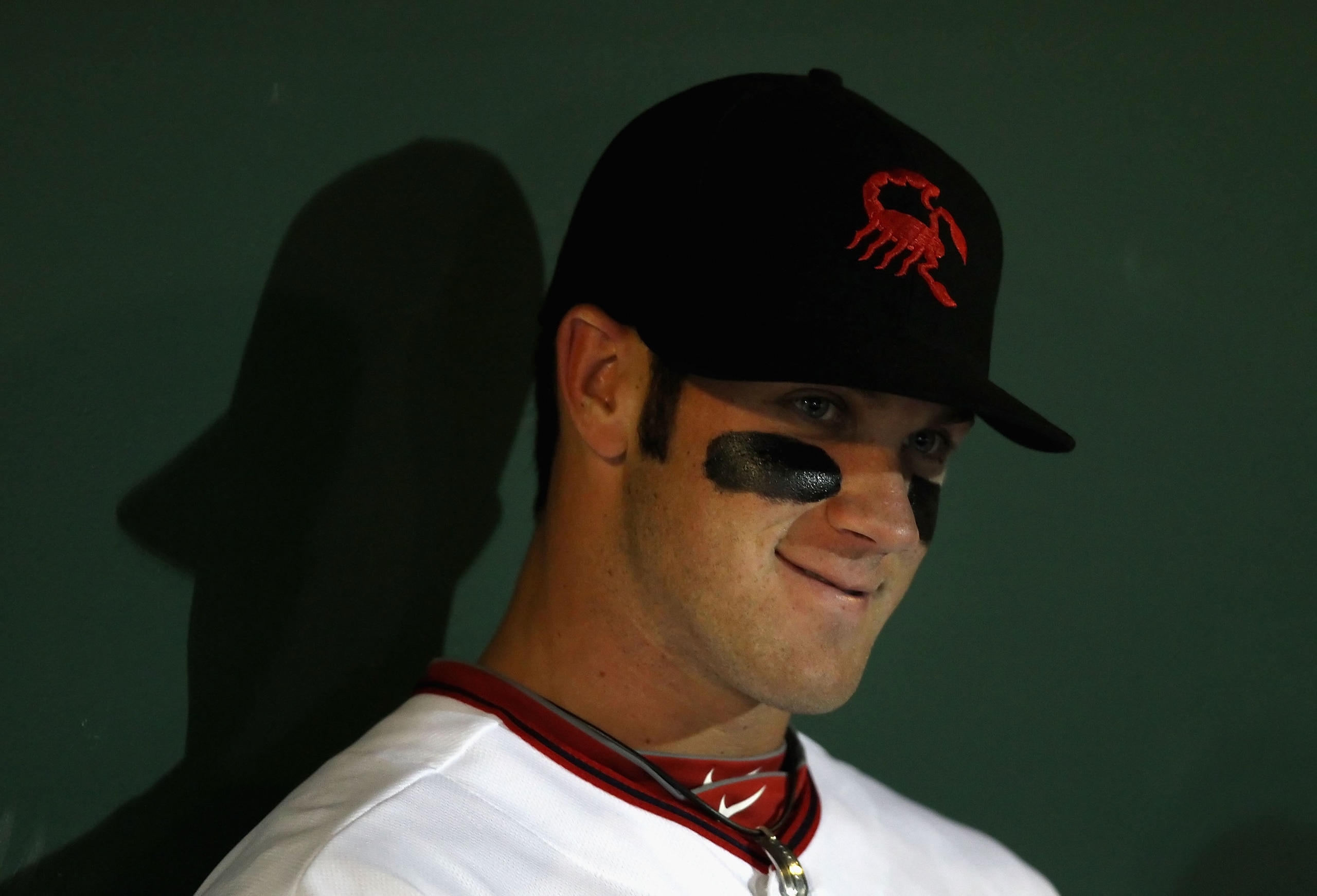 SCOTTSDALE, AZ - OCTOBER 20: Washington Nationals prospect, Bryce Harper #34 playing for the Scottsdale Scorpions sits in the dugout during the AZ Fall League game against the Mesa Solar Sox at Scottsdale Stadium on October 20, 2010 in Scottsdale, Arizon SCOTTSDALE, AZ - OCTOBER 20: Washington Nationals prospect, Bryce Harper #34 playing for the Scottsdale Scorpions sits in the dugout during the AZ Fall League game against the Mesa Solar Sox at Scottsdale Stadium on October 20, 2010 in Scottsdale, Arizon