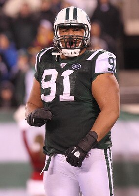 EAST RUTHERFORD, NJ - DECEMBER 12:  Sione Pouha #91 of the New York Jets reacts the Miami Dolphins at New Meadowlands Stadium on December 12, 2010 in East Rutherford, New Jersey.  (Photo by Nick Laham/Getty Images)