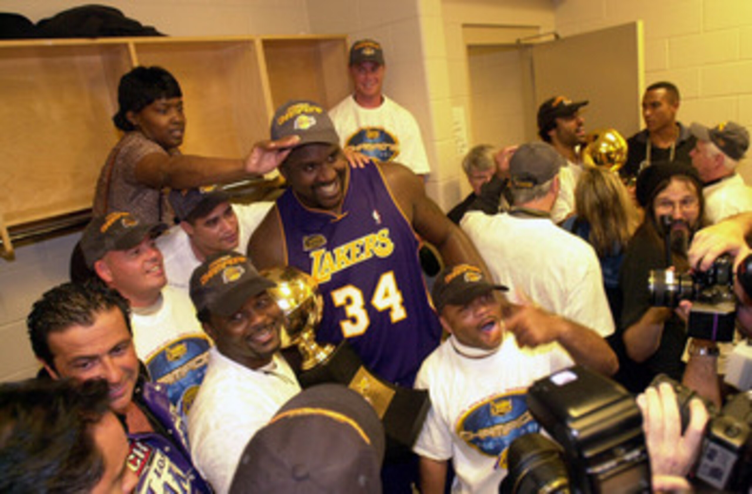 13 Jun 2001:  Shaquille O''Neal of the Los Angeles Lakers receives a high-five from teammate Kobe Bryant #8 during Game 4 of the NBA Finals against the Philadelphia 76ers at the First Union Center in Philadelphia, Pennsylvania.   DIGITAL IMAGE Mandatory C