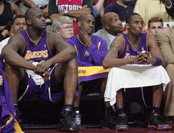 AUBURN HILLS, MI - JUNE 15:  Shaquille O'Neal #34 of the Los Angeles Lakers looks on from the bench in the fourth quarter of game five of the 2004 NBA Finals against the Detroit Pistons on June 15, 2004 at The Palace of Auburn Hills in Auburn Hills, Michi