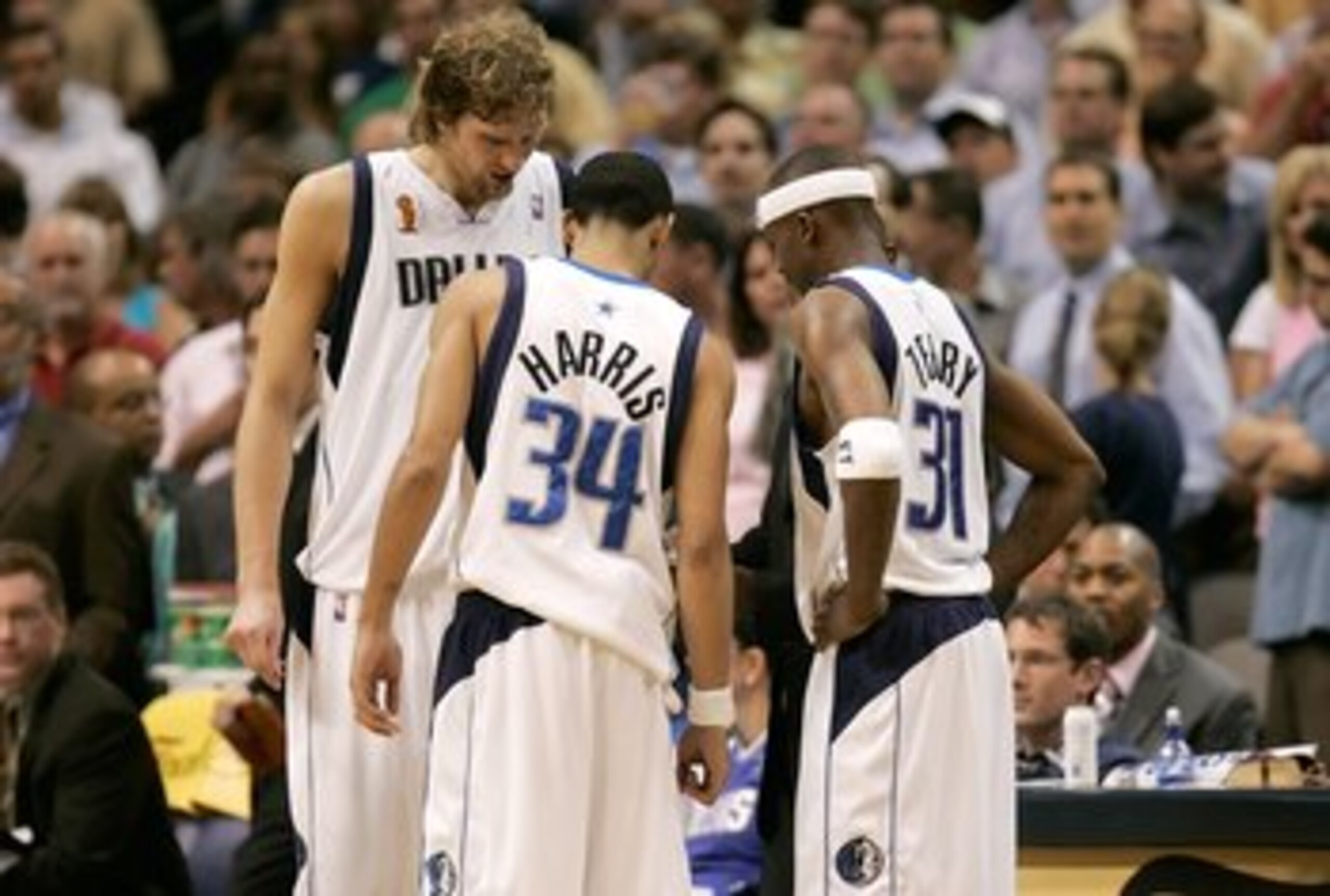 DALLAS - JUNE 20:  Owner Mark Cuban and Darrell Armstrong #10 of the Dallas Mavericks watch the final moments of the Mavericks loss to the Miami Heat in game six of the 2006 NBA Finals on June 20, 2006 at American Airlines Center in Dallas, Texas.  The He