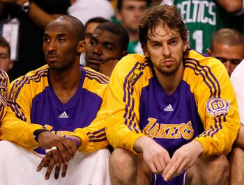 BOSTON - JUNE 17:  Kobe Bryant #24 and Derek Fisher #2 of the Los Angeles Lakers walk to the bench as the Lakers trail the Boston Celtics in Game Six of the 2008 NBA Finals on June 17, 2008 at TD Banknorth Garden in Boston, Massachusetts. NOTE TO USER: Us