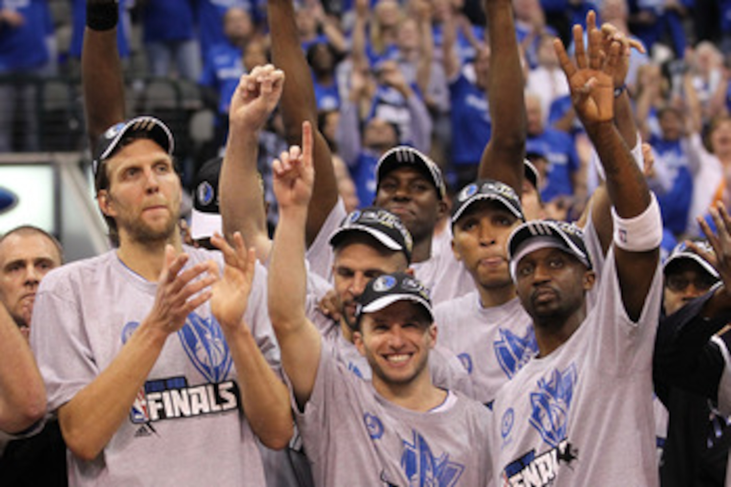 DALLAS, TX - MAY 25:  Dirk Nowitzki #41, Jason Terry #31 and the Dallas Mavericks celebrate their 100-96 victory against the Oklahoma City Thunder in Game Five of the Western Conference Finals during the 2011 NBA Playoffs at American Airlines Center on Ma