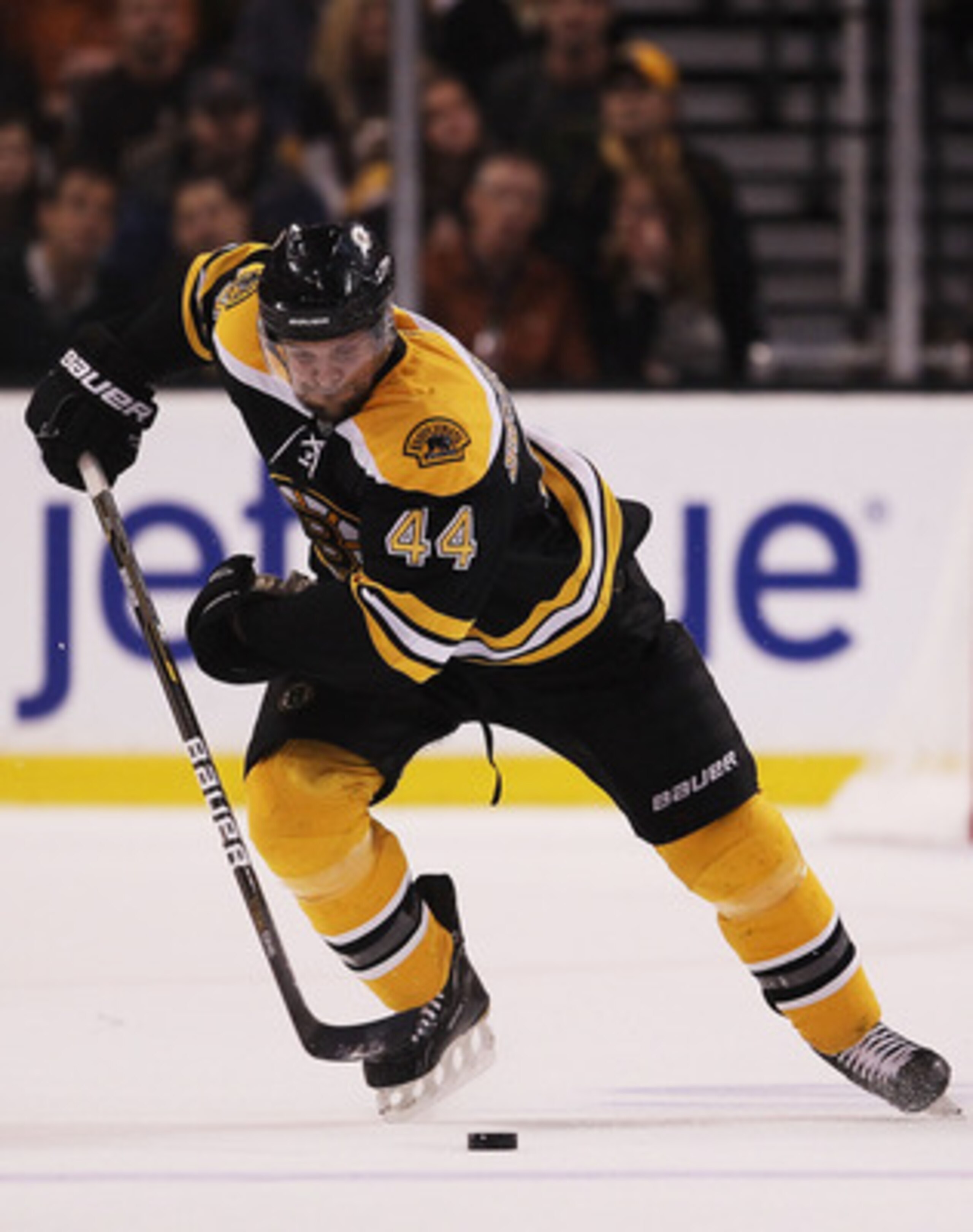 BOSTON, MA - MAY 23: Dennis Seidenberg #44 of the Boston Bruins controls the puck in Game Five of the Eastern Conference Finals against the Tampa Bay Lightning during the 2011 NHL Stanley Cup Playoffs at TD Garden on May 23, 2011 in Boston, Massachusetts BOSTON, MA - MAY 23: Dennis Seidenberg #44 of the Boston Bruins controls the puck in Game Five of the Eastern Conference Finals against the Tampa Bay Lightning during the 2011 NHL Stanley Cup Playoffs at TD Garden on May 23, 2011 in Boston, Massachusetts